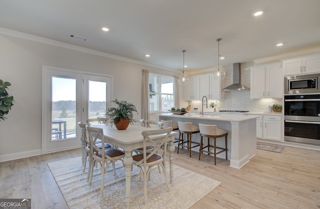 Photo of 683 Secret Garden Lane, Dacula, GA 30019 (MLS # 10696697)