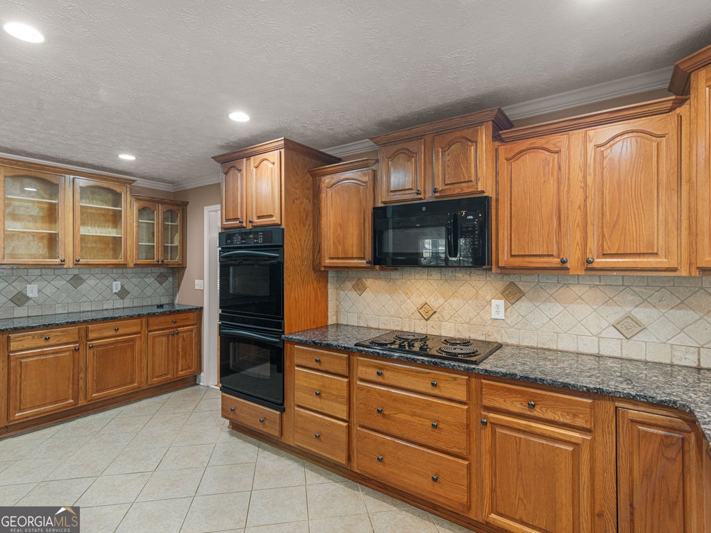 Photo of 720 Kirkland Road, Covington, GA 30016 (MLS # 10874823)
