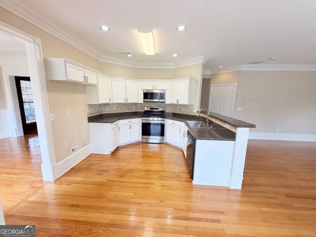 Photo of 1414 Belfaire Lake Trail, Dacula, GA 30019 (MLS # 10848900)