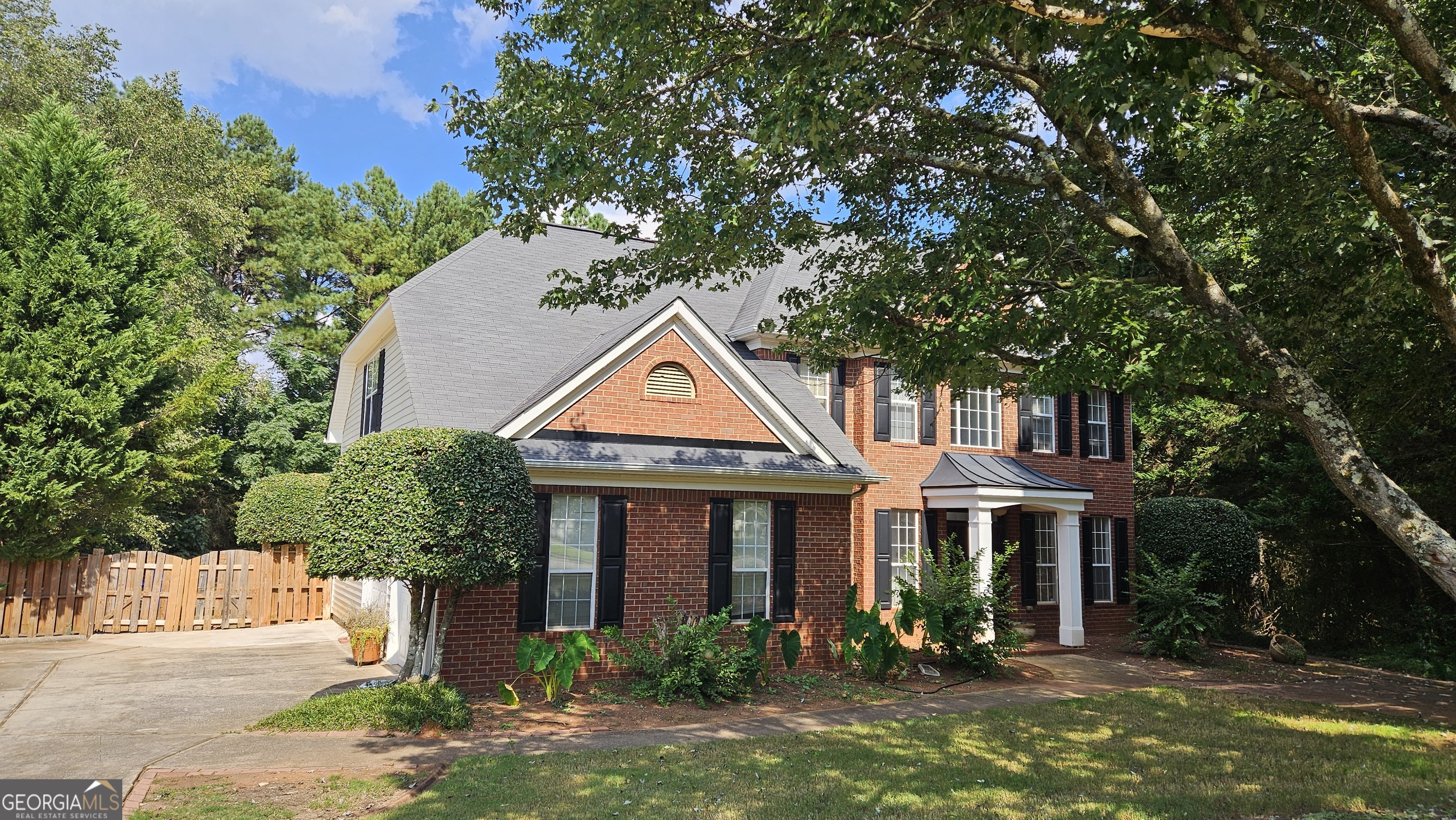 Welcome to this beautiful solid brick home located in the sought-after Lakeside on Redwine community, where you'll enjoy resort-style amenities including tennis, swimming, clubhouse, and park. With 5 bedrooms and 3 full baths, this home offers plenty of room for family and guests. Step inside to a bright and open layout featuring a welcoming foyer, a large family room with a cozy fireplace, formal living and dining rooms. The kitchen is designed for both style and function. Perfect for gatherings! Upstairs feature the spacious owner's suite with a walk-in closet, double vanity, soaking tub, and separate shower. In addition, there are three other bedrooms and a beautifully renovated full bath. The very large backyard is ideal for entertaining, gardening, or simply enjoying peaceful evenings. With award-winning schools nearby and easy access to shopping, dining, and entertainment, this property offers the best of both comfort and convenience.