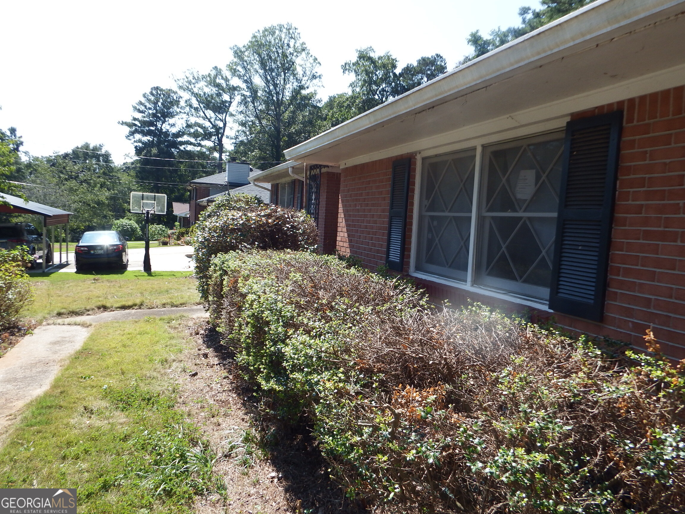 Come See! Come Save! Great Opportunity to bring your vision & creativity to this single-family home with loads with potential. Featuring 3 bedrooms and 2 baths, with a bonus room, and over 2000 sq ft of living space. Located in a prime Stone Mountain location. This home includes a separate dining Room/living room combo with a fireplace. A private backyard with a concrete patio. Close to shopping & transportation. Wow! What A Deal!