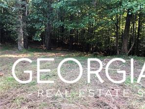 Come and Relax in the North Georgia Mountains with 35+ acres of partially wooded, privacy! Great tract in Talking Rock to build your dream home and enjoy nature at it's best with family and all your animals! This property offers over 700 feet of highway frontage lending to a great entrance for a Family Compound and also has 1,400 feet of frontage on the creek. This tract is located in Pickens County with multiple options for land use. Could be developed.