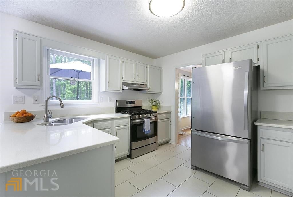 Photo of 210 Spring Forest Way, Sharpsburg, GA 30277 (MLS # 10857014)