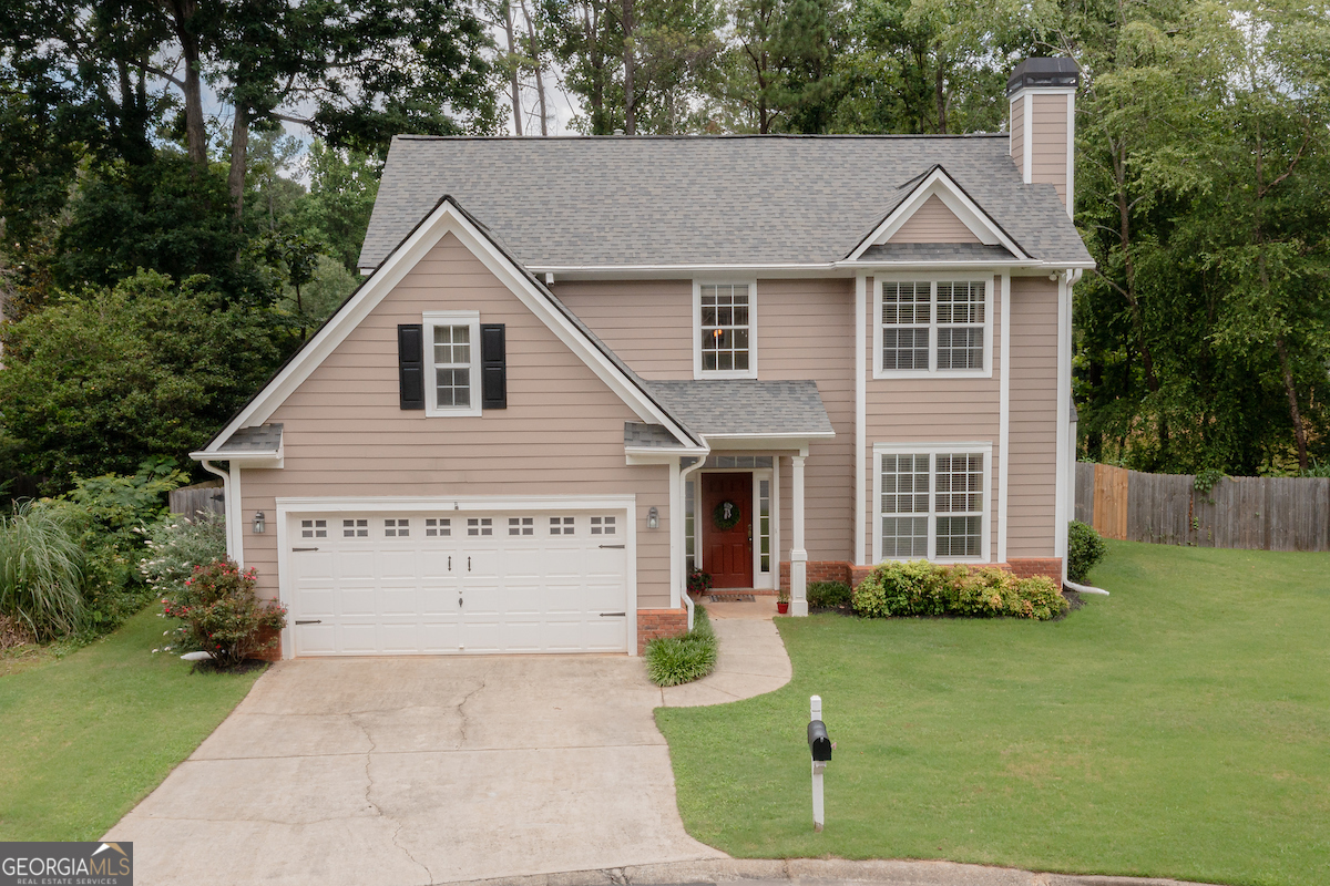 Back on the market at no fault of the seller. Second Chance! Welcome to a charming, thoughtfully updated home tucked away on a quiet cul-de-sac lot in the heart of East Cobb. This 3-bedroom, 2.5-bathroom home is an entertainer's dream filled with natural light, perfect for modern living and entertaining. Spacious main level with hardwood floors, an open-concept living and dining area. The kitchen is bright and functional, featuring 18" travertine tile flooring, stainless steel appliances, tile backsplash, white cabinetry, and a sleek stainless sink. Enjoy year-round relaxation in the huge sunroom with a cozy fireplace, offering a seamless view of the private, fenced backyard-perfect for morning coffee or evening unwinding. Step outside to a covered deck, ideal for hosting gatherings or enjoying peaceful afternoons. Upstairs, you will find the spacious primary suite features vaulted ceilings, a walk-in closet, and a private owner's suite bath, while two additional bedrooms and an updated hall bath provide comfort for family or guests. Located in a kid-friendly, quiet neighborhood, this home is just minutes from Mountain View Aquatic Center, Mt. View Middle School, parks, libraries, and local favorites like Publix, Kroger, Home Depot, and a variety of restaurants. This home offers the ideal combination of privacy, location, and livability. This is a wonderful opportunity to own a move-in-ready East Cobb neighborhood in a top-rated school district. Schedule your private showing today!