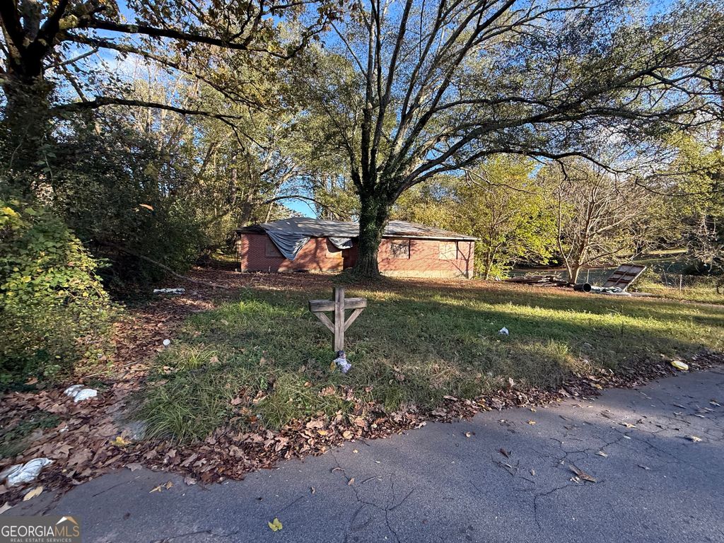 Photo of 395 Woodlawn Avenue NW, Atlanta, GA 30318 (MLS # 10763804)