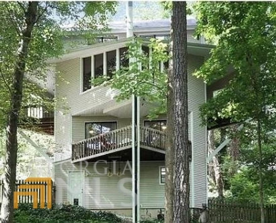 Fantastic opportunity in the HIGHLY sought after and well maintained neighborhood of Cedar Cliffs!! This unique move in ready home on a private wooded half acre lot with amazing outdoor spaces has just been freshly updated. Fresh Paint and brand new floors on 2/3 levels along with updated stairs and lighting.  The inviting foyer leads to a gourmet kitchen with custom cabinets, granite, large island with storage, stainless steel appliances, wine fridge, two sinks and two ovens! There is a large laundry room and half bath off the foyer with tons of storage space!  The large open living area w/ vaulted ceilings has panoramic windows showcasing the treetop views and the sizable half acre fenced in backyard.  Great for entertaining your guests around the fire pit and a treat for 4 legged friends with 2 doggy doors. Two sliding glass doors lead to two covered decks on the main level, great for grilling! Additionally, each secondary bedroom on the lower level has access to its own covered deck and has its own full bath great for kids or roommates.  The primary suite is oversized and features a sitting area and large windows overlooking the treetops and backyard. The large remodeled ensuite bathroom has a HUGE walk-in closet, double vanities, jetted tub, storage closet, and a large tiled shower that includes dual shower heads, bench, and glass enclosure. There is also a separate room for a private office or nursery just across the hall from the primary suite. Great for working from home!  This home also features a Two-car garage with HVAC on the lower level that has plenty of storage space!! This lovely community with no HOA is well maintained and 3 miles from The Battery Atlanta and Truist Park and just 2 miles from 285/75, Cumberland mall, and  Smyrna Market Village. Don’t sleep on this one or you’ll wake up regretting it! Comes with all appliances and washer/dryer. Open House this weekend!