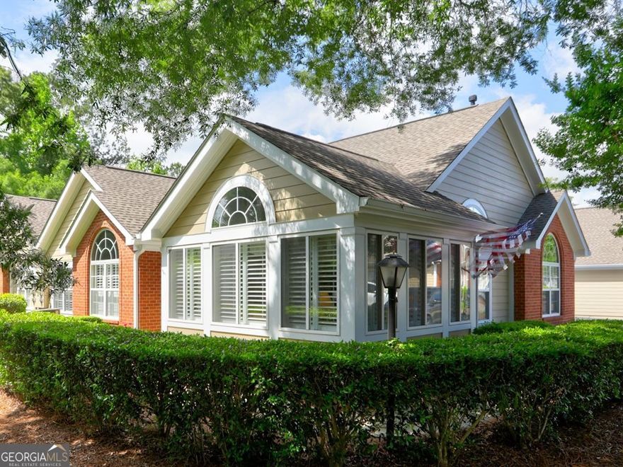 Beautiful condo in highly sought after Vintage Club! This community has all you are looking for in your next move with carefree living at its best! You'll have all your outside maintenance taken care of, along with monthly socials. This condo has beautiful wood floors with updated appliances and plantation shutters. Nestled in a private location in the community. You are a mile from I-75 and I-575 along with nearby Town Center Mall, many more shops and restaurants for your convenience. Noonday Creek Trail is a block away with a walking trail and bike rentals available. This is a must see on your next tour of homes!