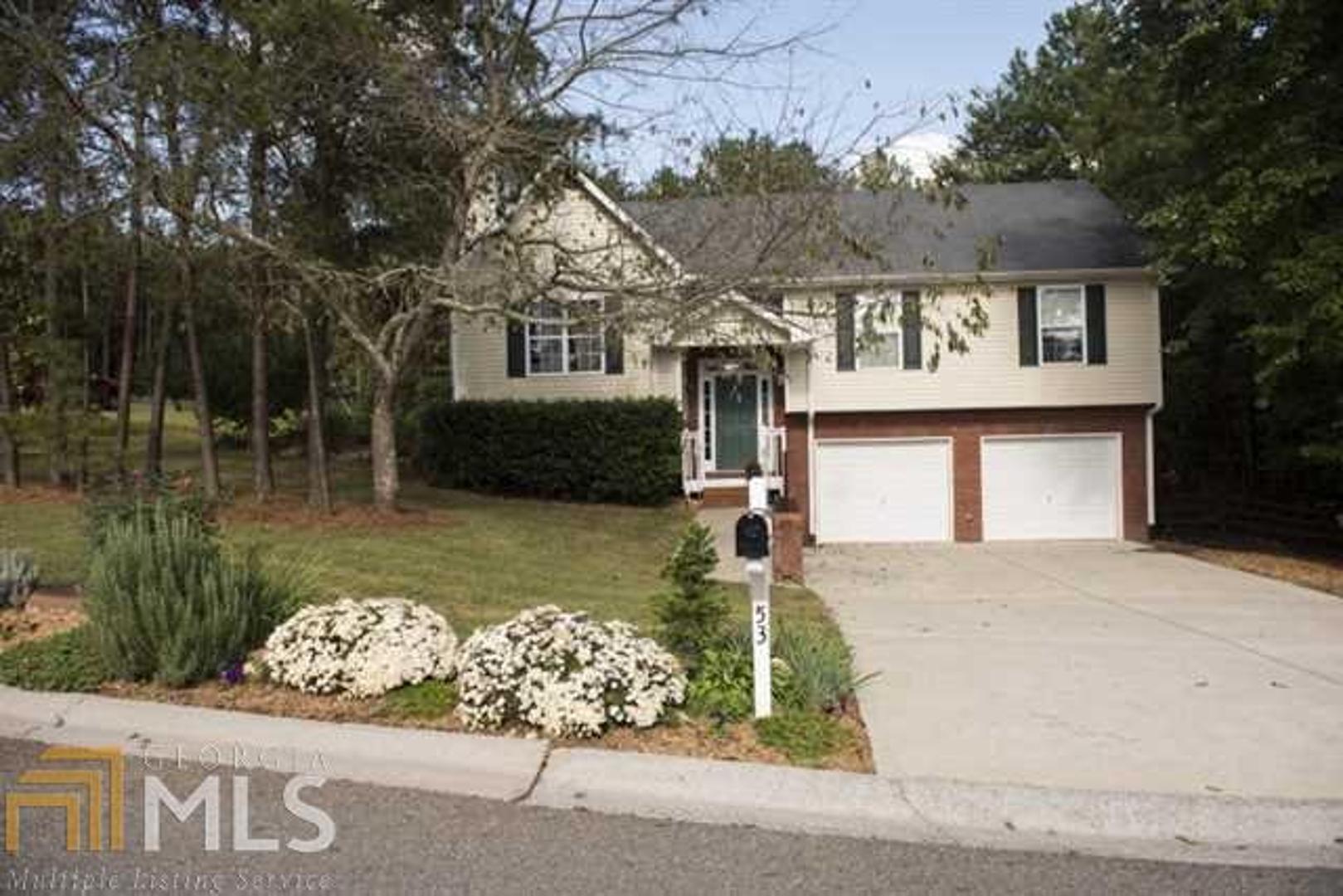 BE FIRST! Open the door to this IMMACULATE home and you will not want to leave! Its open and inviting feeling says you are HOME! 3 Large bedrooms and 3 baths. Master bath has double vanity. Features beautiful hardwoods. Beautiful open kitchen. A fireplace with built in book shelves on both sides. Cozy breakfast area with view of beautiful back yard. Finished basement that would be great for an in-law or teen. Fenced back yard. Irrigation system in front and back yard and drip irrigation in garden area. Professionally landscaped front and back yard. A storage building in back. Quiet neighborhood that is conviently located to I-75. Call