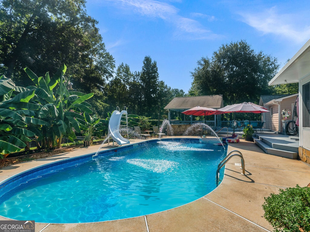 Photo of 837 Sunset Drive, Locust Grove, GA 30248 (MLS # 10824173)
