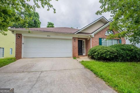 Photo of 4890 Wilkins Station Drive, Decatur, GA 30035 (MLS # 10592496)