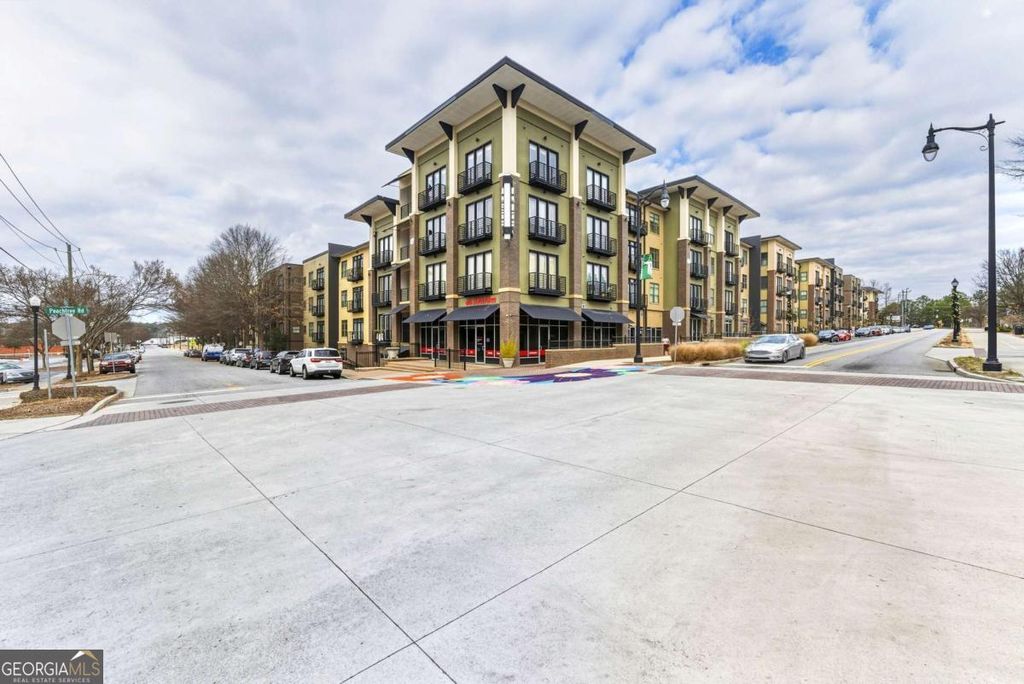 Photo of 5300 Peachtree Road #504, Atlanta, GA 30341 (MLS # 10740077)