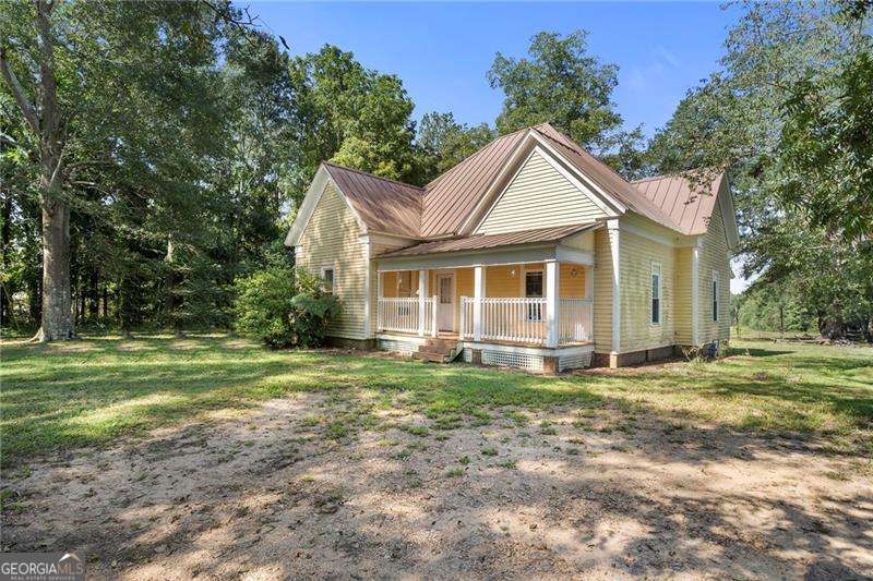 You've found it! !3.4 acres that are pretty cleared up and level! Already circled for your cattle! This gorgeous property is just ready for it's new owner to give it some love! This private oasis just screams tranquility and farm living. The main home looks very spacious with a cozy atmosphere. Priced to sell fast you do not want to miss this grand opportunity to own this gorgeous home. I can already imagine what wonders you can do to this home because it already boasts with high ceilings, pine flooring and lots of natural light beaming through this farm house. Come see it and fall in love!