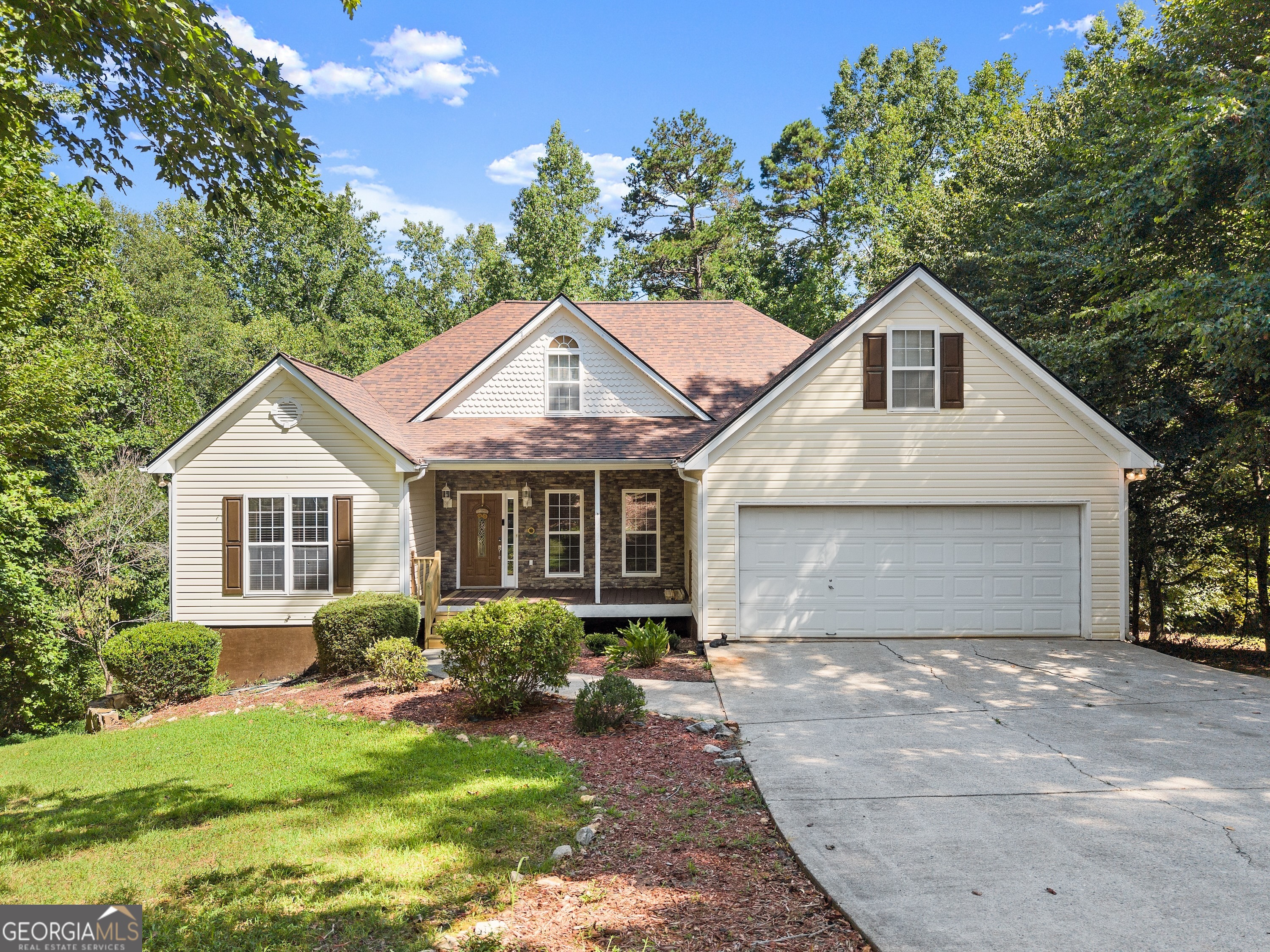 Wonderful 3br/3.5ba Home with mostly finished basement and frontage on Little River! This spacious home features a great layout offering an open living area w/gas log fireplace and built in book shelves, kitchen w/solid surface countertops, breakfast area, formal dining room, and master suite on main level complete with double vanity, garden tub, separate shower, and walk in closet. Upstairs you will find 2 secondary bedrooms, a shared hallway bath, and a large floored bonus room that is perfect for storage. If that isn't enough space for you then slip on down to the basement where there is an extra large finished recreation room, 4th sleeping area, office, full bath, and workshop! This home also features a 2 car garage, covered front porch, screened in back porch, open deck on main level, and secondary lower level deck off workshop area. Conveniently located with easy access to Hwy 129! 1 year Home Warranty Included at Closing!