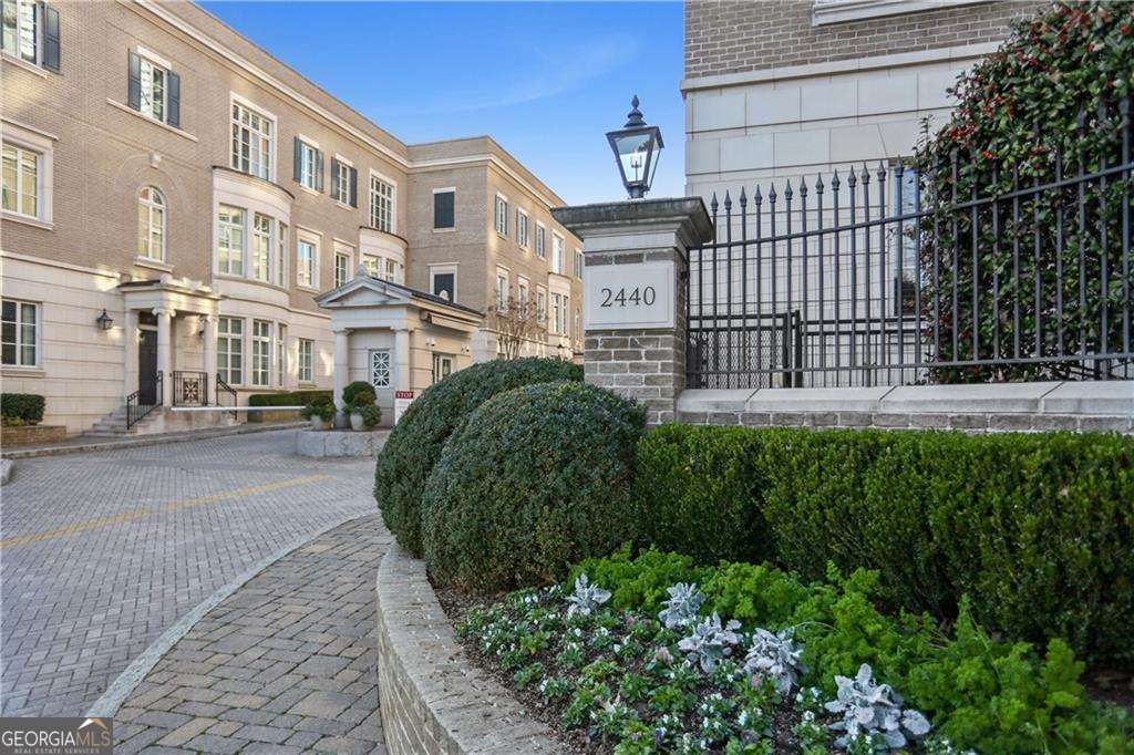 Rare Regents Park Penthouse This is your chance to own the premier flat in prestigious Regents Park - a penthouse-level residence with soaring 11'-13' ceilings and exceptional architectural detail. Designed for refined one-level living, this home offers a private elevator to both the main residence and a separate, climate-controlled space on the garage level with a full bath, currently serving as a gym. Inside, 3 bedrooms and 3.5 baths are enhanced by coffered, groin-vaulted, and beamed ceilings, creating a sense of timeless elegance. Each of the three full baths features heated floors for year-round comfort. Every detail reflects thoughtful upgrades and fine craftsmanship, from the gourmet kitchen to the luxurious primary suite. Enjoy the convenience of your own private 2-car garage, along with access to Regents Park's rare 1-acre community park - a tranquil green space in the heart of the city. All of Buckhead's fine dining, shopping, and cultural offerings are moments away, yet your home remains a serene, private retreat. A rare offering in one of Atlanta's most exclusive addresses - this is penthouse living at its finest.