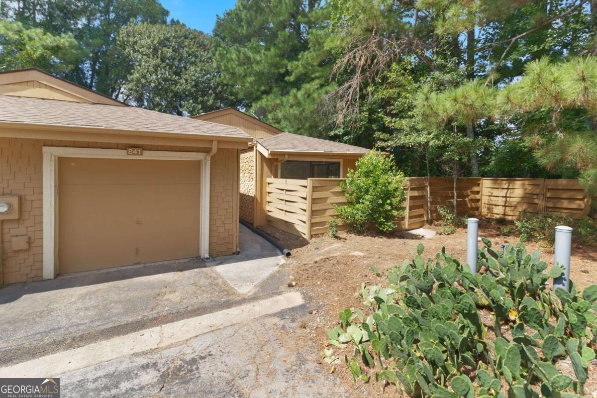 Stunningly renovated 3 bed/2 bath home featuring brand new Luxury Vinyl Plank flooring, new interior paint, new lighting and plumbing fixtures everywhere, new granite countertops in kitchen and bathrooms, and new stainless-steel appliances. Large living room offers tall ceilings, exposed beams, fireplace, and dining area. Kitchen offers white cabinets, new stainless steel appliances, new granite countertops, and access to the patio. Large Double Master bedrooms offering En-suites with new granite countertops, one offering a walk in shower, the other offering a tub/shower combo, and walk-in closets. Third bedroom provides large sliding glass doors. Out back the patio overlooks the fenced in backyard.