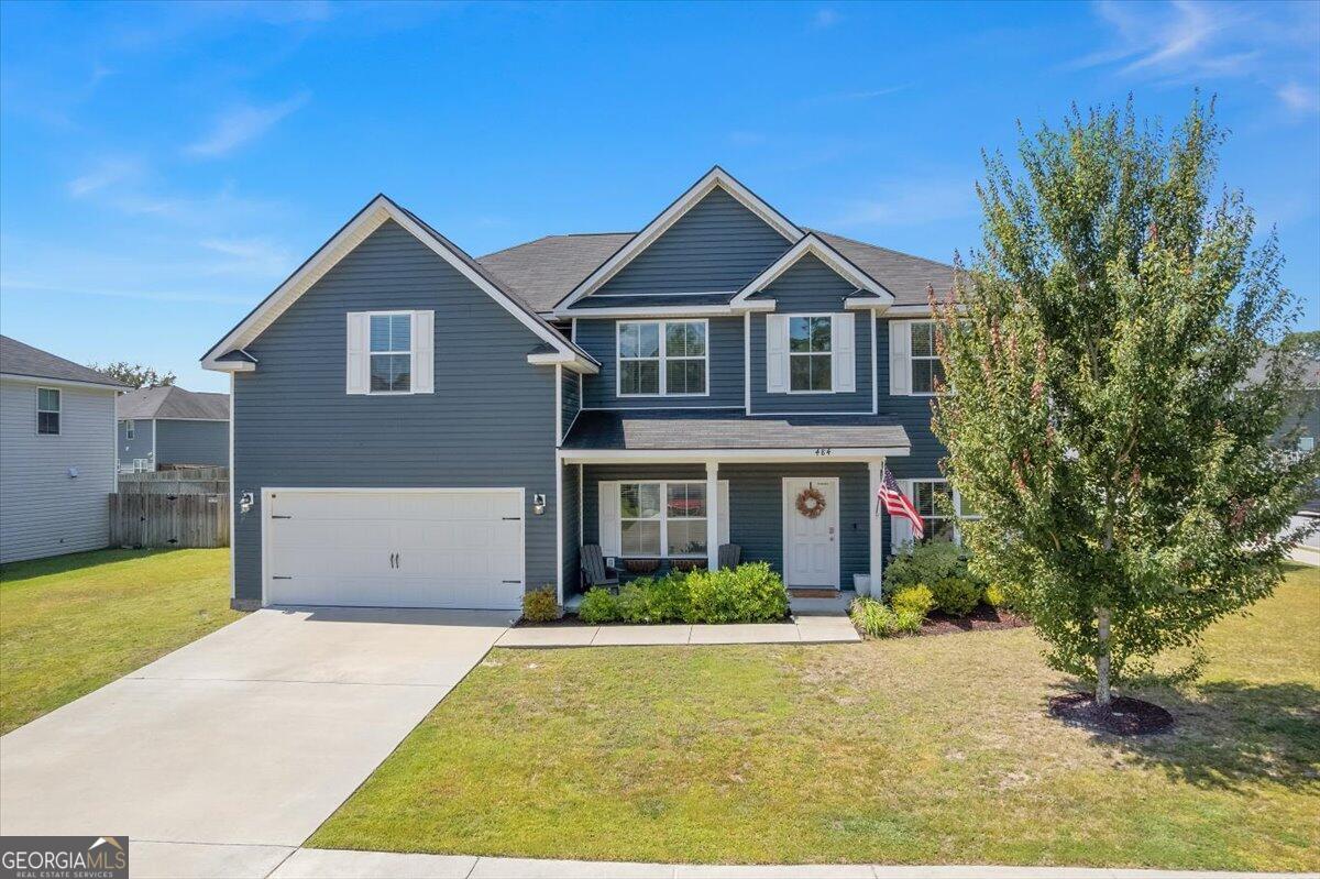Welcome to this 5-bed, 3-bath home situated on a desirable corner lot. With updates throughout, this home blends modern finishes with timeless charm. Step inside the two-story foyer to find inviting wooden archways, a cozy shiplap fireplace surround, and an open layout that flows seamlessly for everyday living and entertaining. The kitchen boasts quartz countertops, ample cabinetry, and a spacious design great for gatherings. The main level features a private mother-in-law suite with its own en suite bath, offering comfort and convenience for guests. Upstairs, the oversized master bedroom serves as a true retreat with plenty of room for a sitting area. Outside, enjoy a fully fenced-in backyard that the family is sure to love! Located just minutes from shopping and Cherokee Rose Golf Course.