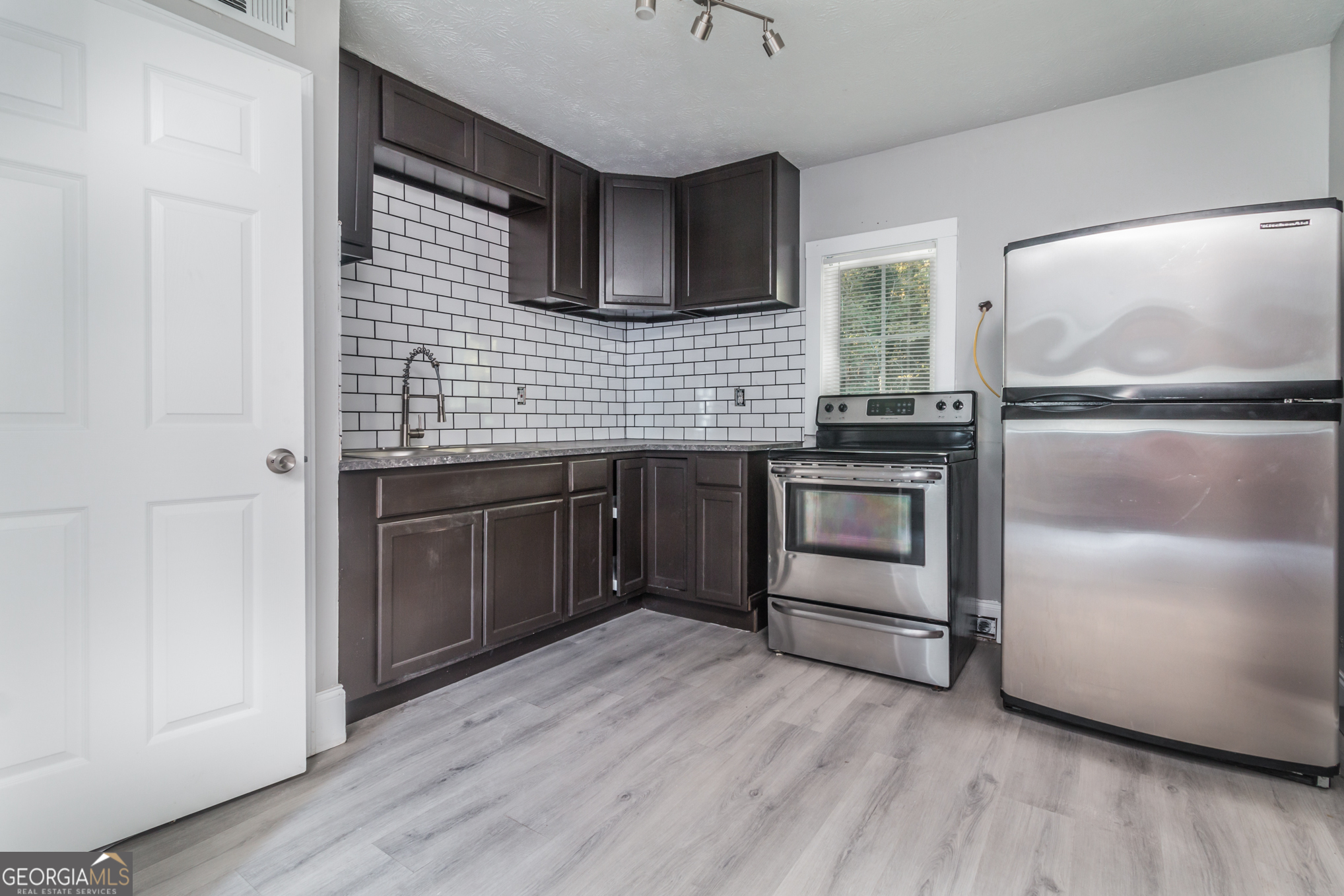 Updated to $999/month. 511 Gresham Park Blvd is a quad-style multifamily property offering four individual 2-bedroom, 1-bath units. Each unit features a private entrance, spacious living areas and bedrooms, in-unit laundry connections, off-street parking, and individually metered utilities and HVAC systems. Conveniently located near I-75, Marietta Square, and Dobbins Air Reserve Base, with easy access to schools, shopping, and major employment hubs. Showings by appointment only. Please do not disturb current residents. Rental qualifications and application instructions available upon request.