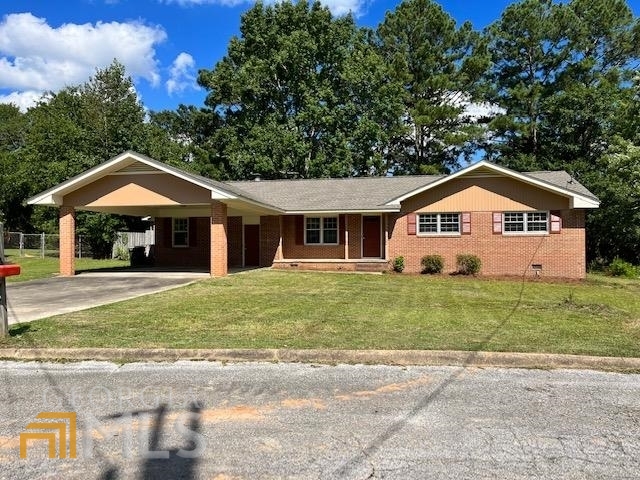 Great 4 sided brick home. Total renovation new roof ,new flooring, new bathrooms tile, new stainless steel appliances, large carport, privacy fence large back yard.