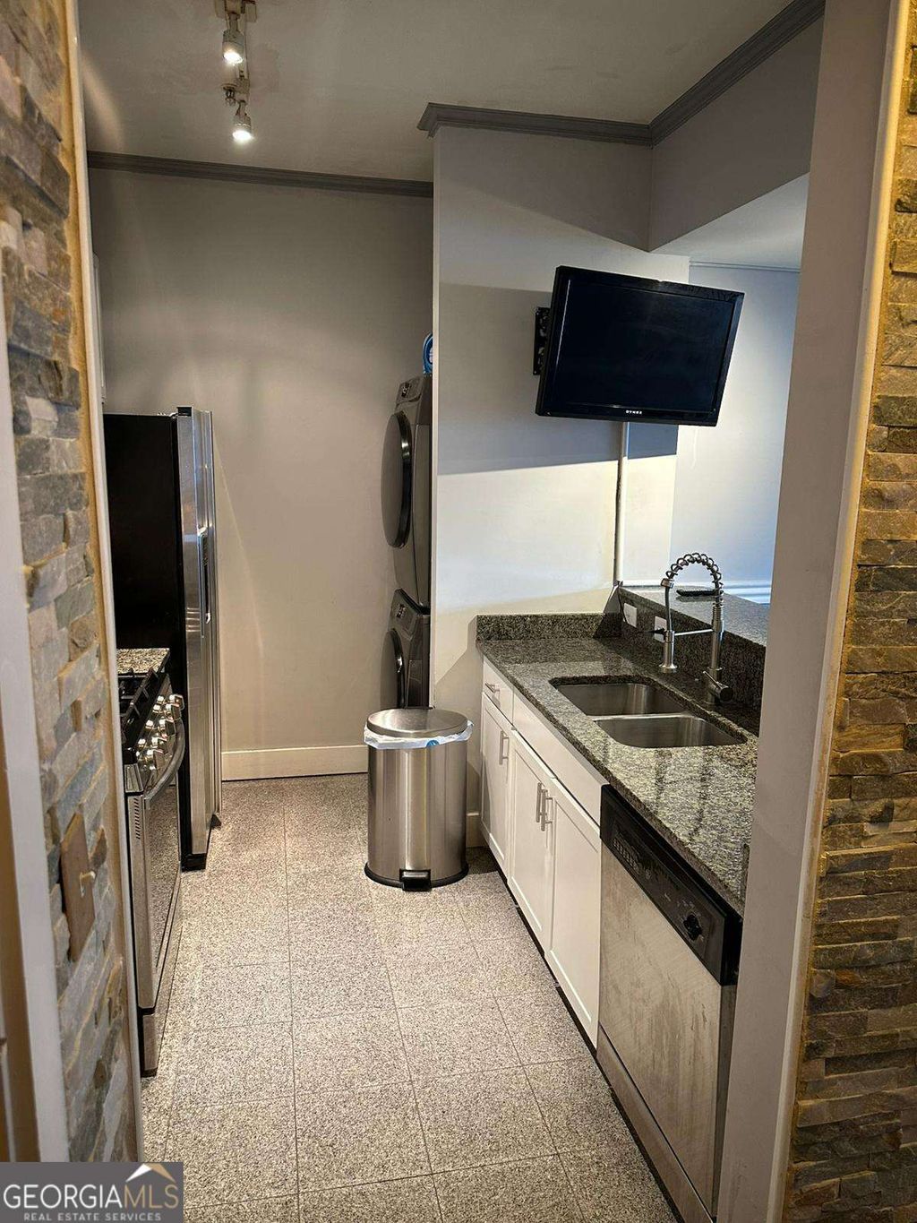 Photo of 799 Hammond Drive #409, Atlanta, GA 30328 (MLS # 10650363)