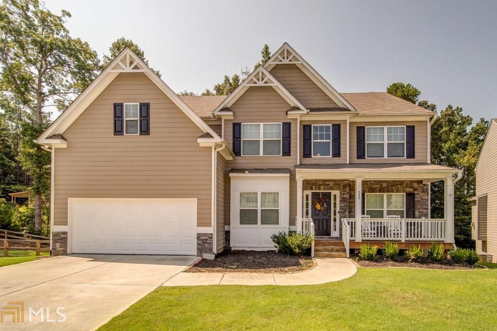 Like New & Absolutely Gorgeous! Cul de sac Lot. Open Floor Plan. Hardwoods throughout. Stunning Chef’s Kitchen featuring Large Island, Granite, Double Ovens, Stainless Appliances, Desk, Butler’s Pantry, & Large Walk in Pantry. Kitchen Open to Family Room. Two Story Family Room w/Stone Fireplace. Plus, Large Dining Room w/Wall & Crown Moulding & Spacious Office/Formal Living. Bedroom & Full Bath on Main. Iron Spindles & Open Hallway w/Arches. Large Master Suite features Trey Ceiling, Sitting Room, Master bath w/Granite, Double Vanities, Garden Tub, Large Shower & Awesome Walk in Closet w/ Built In’s. Additional Bedroom has Private Bath. Two More Bedrooms w/another bath. Huge Unfinished Basement w/stunning Epoxy Metallic Floor. Garage w/Epoxy Floor. Back Deck.