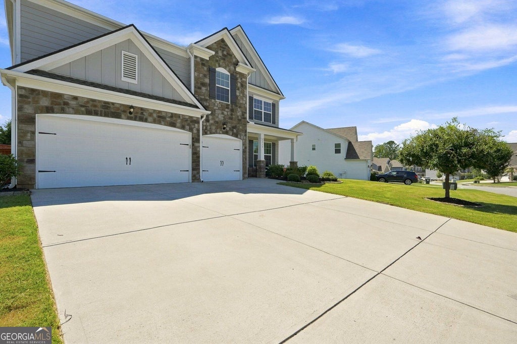 Photo of 6715 Rambling Vale, Cumming, GA 30028 (MLS # 10879427)