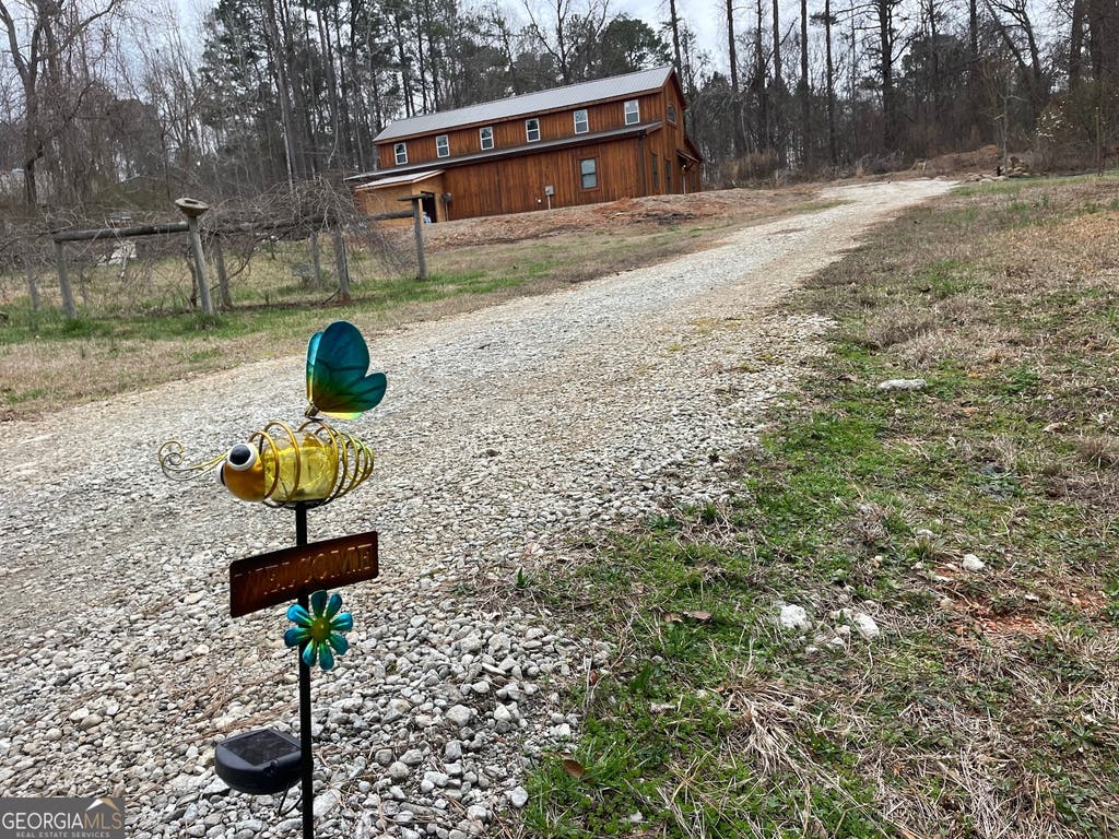 Photo of 8470 Hearn Rd, Chattahoochee Hills, GA 30268 (MLS # 10809357)