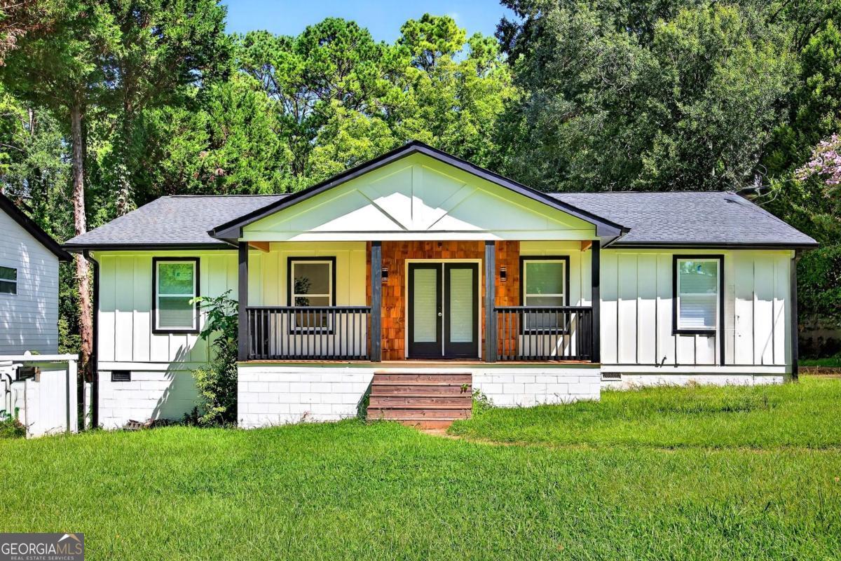Yes, the seller is giving $20,000 towards buyer closing costs or down payment, or a 2-1 buy down ($20,000). This is an amazing 2,400 sqft totally renovated, like-new construction modern craftsman house with real high ceilings throughout. This house has 3 nice-sized bedrooms with 3 big baths in the "main house." (In the main house, you have an AU in the back with 380 sqft with 1 nice-sized bedroom, a nice full bathroom, kitchen area, living room area, and closet. In this AU house, you can let a family move in, use it as a mother-in-law suite, or rent it out for $1,200-$1,400 a month and let it pay some of your mortgage.) This house has everything brand new (everything brand new like a new build): new roof, new gutters, new siding, new windows, all new interior doors, new interior paint, new exterior paint, new switches, new plugs, new plug covers, new ducts, new furnace, new condenser, new vent covers, new kitchen hardware, new exterior porches, 2 new exterior double glass doors, new exterior glass door, new interior framing, new plumbing, new electrical wiring, new electrical panel box, new custom granite with waterfall, new shower glass, new laminate flooring, new light fixtures, new door knobs, new kitchen faucets, new front porch, new back porch, new hot water tank, new insulation, new base trim, new door trim, new toilets, new vanities, new bathroom faucets, new freestanding tub faucets, new recessed lighting, island in kitchen with waterfall, new electrical weatherhead, etc. In the front main house, you have 12-16 foot vaulted ceilings, with 3 really nice bedrooms (the master is really big with a walk-in closet and a double-head shower). It has a double door entry with high vaulted ceilings and an entry glass door to the new back porch overlooking the nice-sized backyard. The master bath has custom, unique tiling on the flooring and walls, double shower heads coming from the wall and ceiling, freestanding tub, and custom, unique vanities in this oasis bathroom. The second bath has custom tile on the floor/wall with a nice vanity, and the public bath has nice tiling on the floor with vanity and double entry door. Kitchen has custom shaker cabinets at the bottom with custom glass cabinets at the top, with a beautiful backsplash and waterfall quartz stone next to a double glass door to the new right-sized back porch with 12-16 foot vaulted ceilings. This house has a big living room/dining room with high ceilings. Also, this house has an office that can be used as a fourth bedroom (so that would make the "main house" a 4 bed / 3 bath at 2,400 sqft). The "AU," the small house in the back, is 380 sqft of open-style floor plan with a nice bedroom area, living room, kitchen set area, closet, and a full bathroom with smooth, slick tiling in the shower. Laminate floors throughout, with high ceilings. (Everything in the AU is brand new. Use the AU for a family member or a mother-in-law suite, or rent it out for $1,200-$1,400 a month and let the income pay some of your mortgage payment $$$.) This house is located in a really nice, sought-out area and street. You have a lot of new builds and renovated homes in the area. This is a really nice, homeowner-quiet street. It's a 10-minute walk to MARTA, 8-minute walk to the bus line, 10-minute drive to I-20/I-285/I-75, 10-minute drive to Tyler Perry Studios, 12-minute walk to the Beltline, 12 minutes from the airport. It's 10 minutes from all 3 golf courses and recreation center, 8 minutes from Adams Park, Cascade Springs Nature Park, 8 minutes from grocery stores, vibrant Lee + White development, Wild Heaven Brewery, ATL HOP, 16 minutes to Mercedes-Benz Stadium, etc. Plus: Home qualifies for up to a $25K no-repayment grant and 100% financing through preferred lenders. Again, we are giving $20,000 towards your down payment, closing costs, or 2-1 buy down. This is a must-see and must-get! A must!!! Total sqft: 2,780