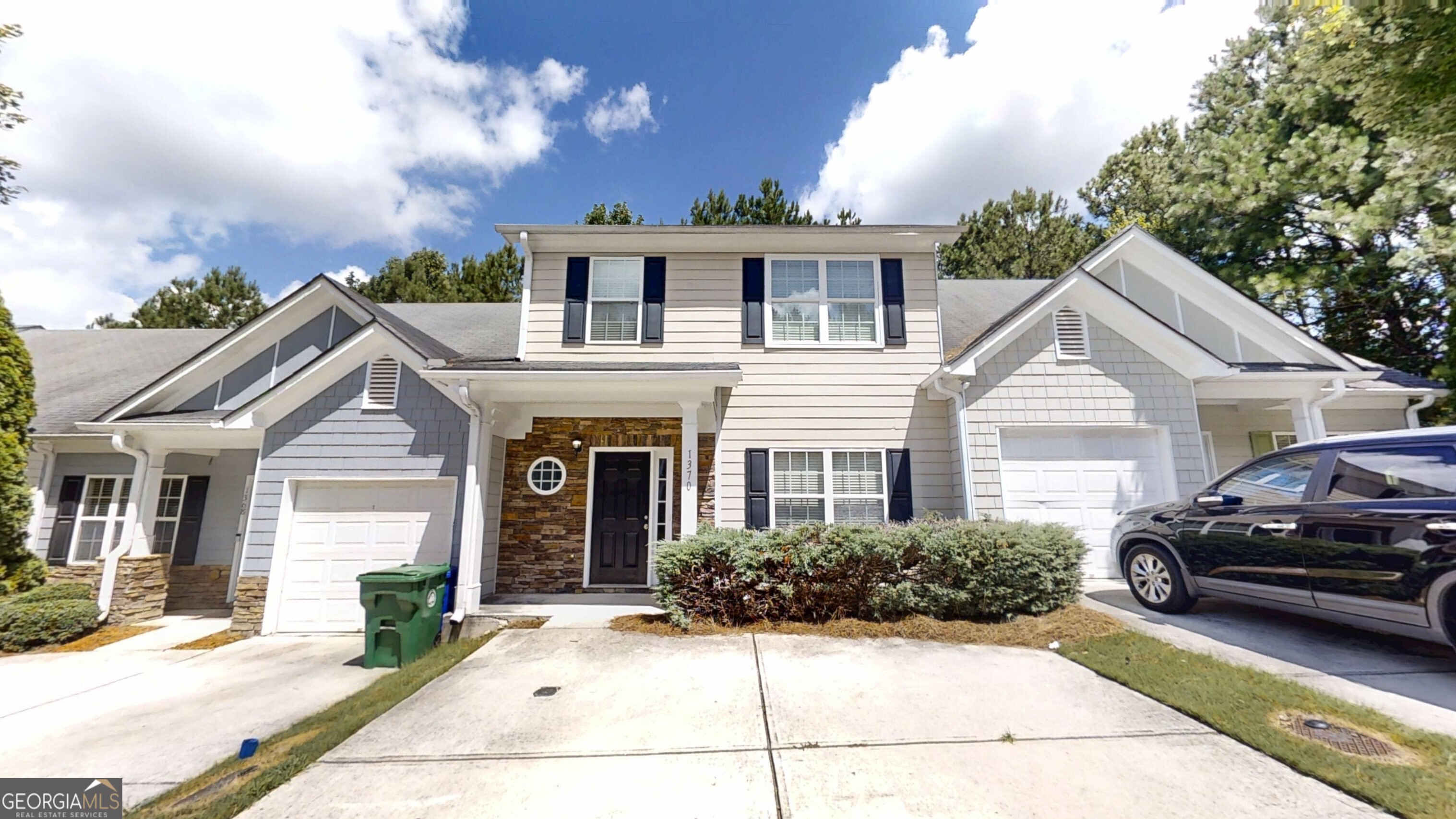 Welcome to this well-maintained 3-bedroom, 2.5-bath townhouse in the sought-after Villas at Rogers Crossing! Freshly painted throughout, this home features durable LVP flooring on the main level and in wet areas, with cozy carpet upstairs for added comfort. Enjoy a spacious family room perfect for relaxing or entertaining, and a well-appointed kitchen with elegant stone countertops and plenty of storage space. Step outside to the rear deck a great spot for barbecues, entertaining, or simply enjoying your morning coffee. Conveniently located just minutes from I-20, shopping, restaurants, and schools, this home offers the perfect combination of comfort, style, and accessibility. Don't miss your chance to own this move-in-ready home in a great location!