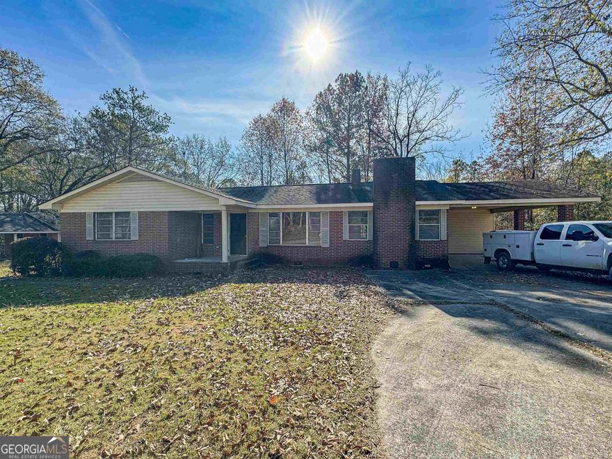 Step into a generous size living/dining area with a wood-burning fireplace. All three bedrooms and living room has beautifully redone hardwood floors. The hall bathroom showcases a stylish tiled shower/tub and new fixtures. A brand-new open-concept kitchen with a breakfast area seamlessly connects to the spacious great room, complete with another wood-burning fireplace and a nearby full bathroom. The laundry area, conveniently located off the carport, offers potential as additional living quarters. Let's not forget about the detached workshop with a two car carport area. This exquisite home is nearing 100% completion and is within minutes of Downtown Washington. Schedule your showing today!