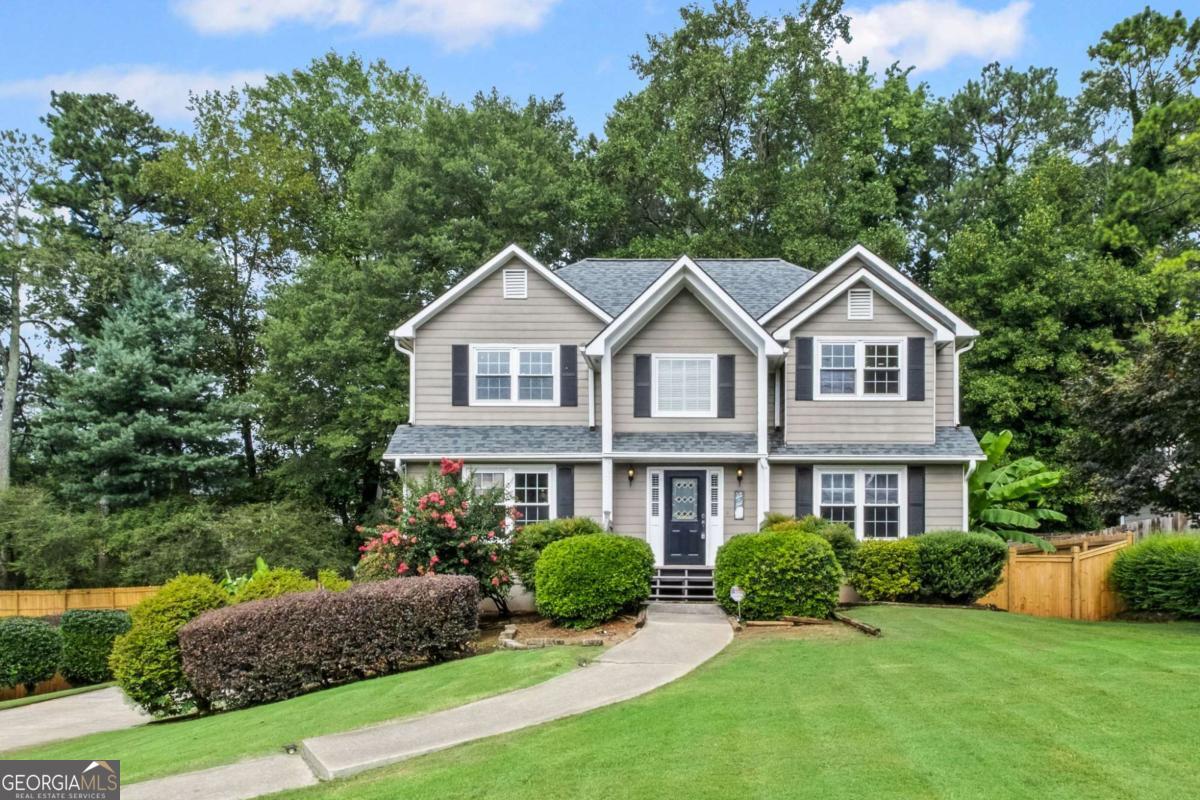 Move in tomorrow! East Cobb charming traditional home on a level lot. This is a great value, so much living space, wide plank bamboo flooring, no carpeting, and a sunlight finished basement. Granite kitchen with stainless appliances with a view to the fireside family room. A covered porch opens to large deck and fenced yard. The finished terrace level includes a media room with a dry bar and a spacious sun filled recreation room. Each adult must apply at https://apply.link/vNqQJLg