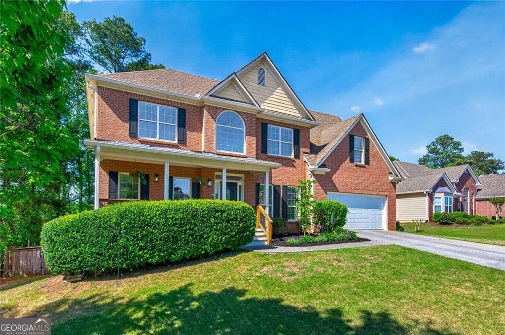 Photo of 1530 Misty Valley Drive, Lawrenceville, GA 30045 (MLS # 10738246)