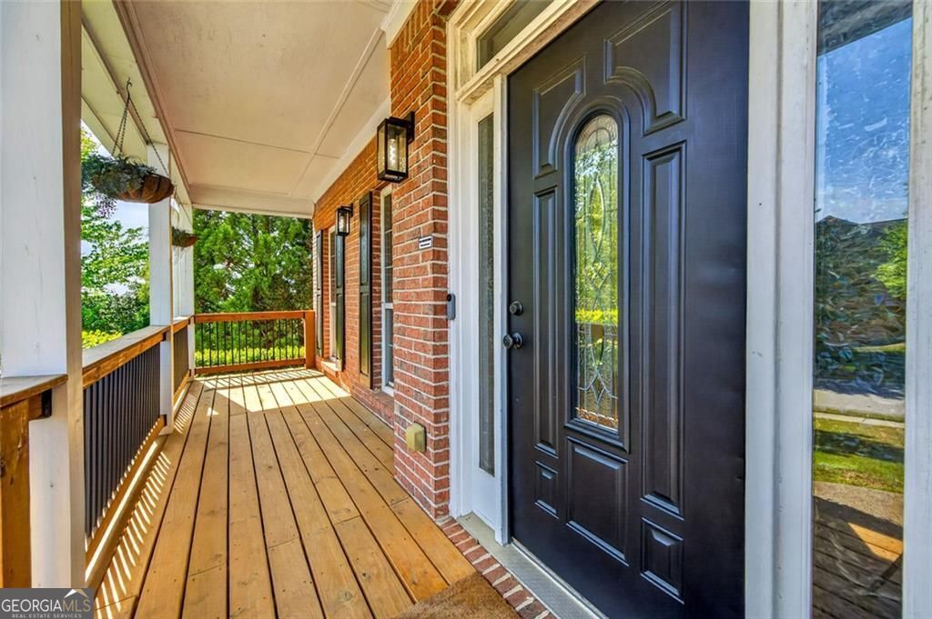 Photo of 1530 Misty Valley Drive, Lawrenceville, GA 30045 (MLS # 10738246)