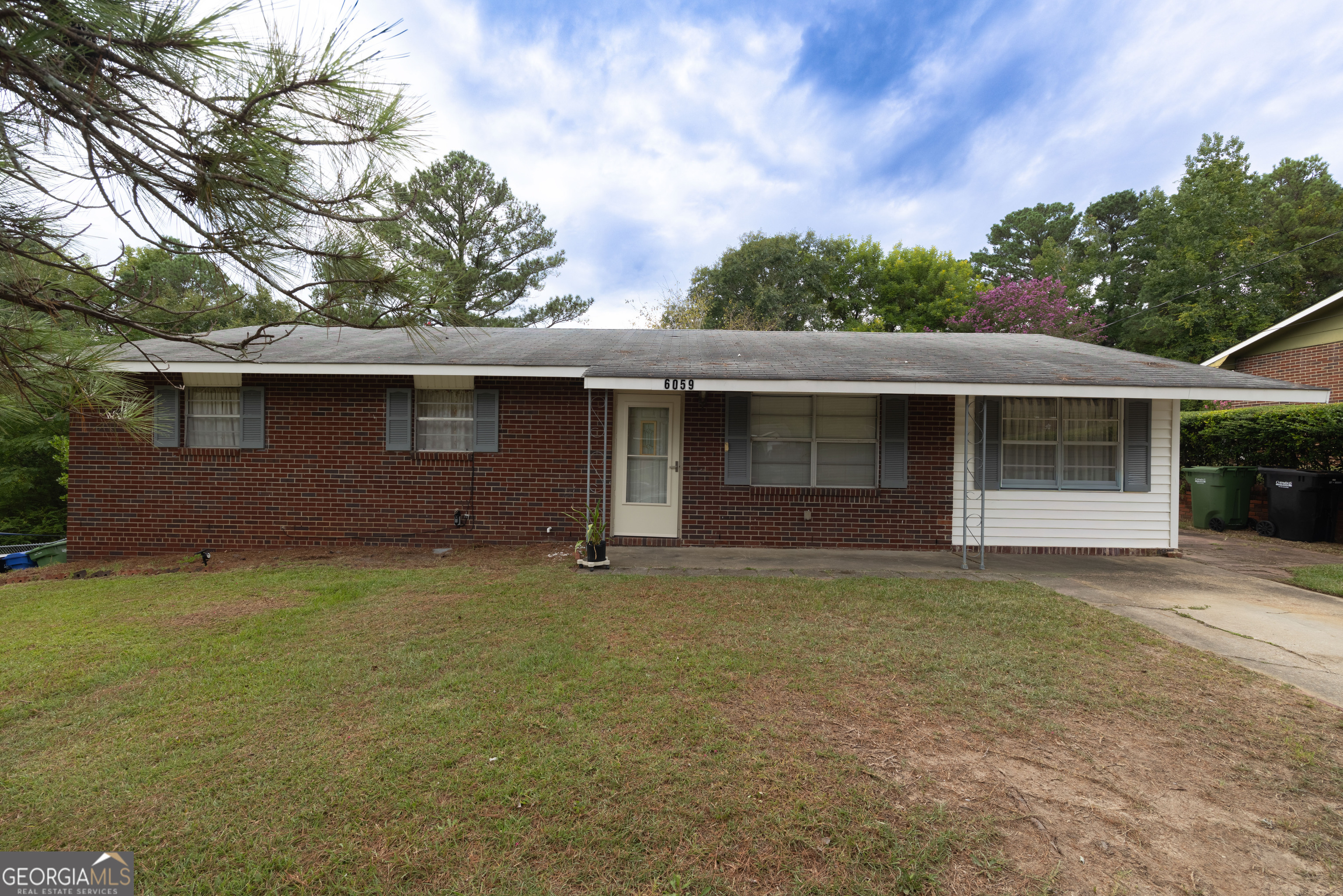 Welcome to this 3 bedroom, 1.5 bath home offering 1,230 sq. ft. of potential in the established Holiday Park neighborhood. Built in 1967, this property features solid bones, a fenced-in yard, and both gas and electric utilities. The lawn is well maintained, while the interior offers a chance for updates and personal touches. Conveniently located near local schools, shopping, and Fort Benning, this home is a great opportunity for buyers looking to add value in a desirable location.