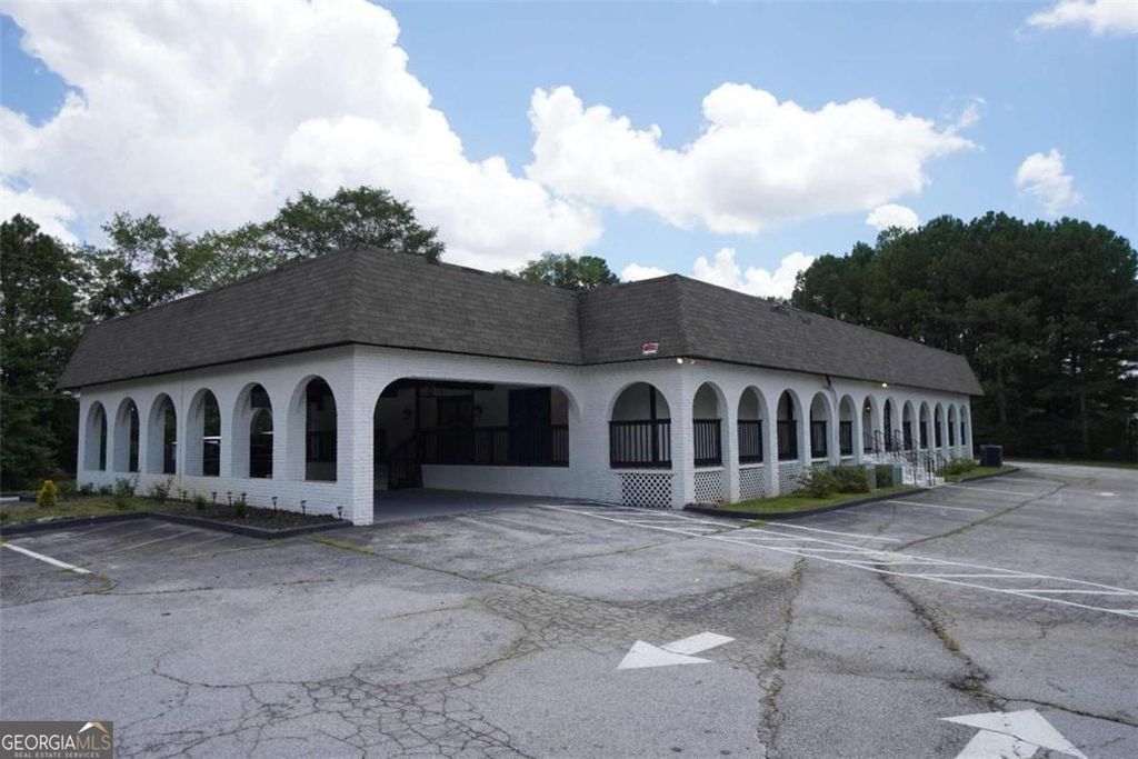 Photo of 2141 Flat Shoals Road SE, Conyers, GA 30013 (MLS # 10663571)