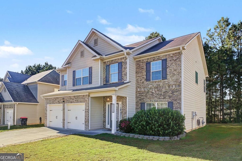 Photo of 5755 Savannah River Road, Atlanta, GA 30349 (MLS # 10878644)