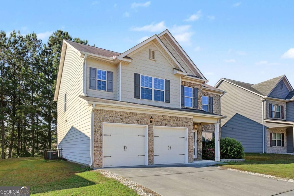 Photo of 5755 Savannah River Road, Atlanta, GA 30349 (MLS # 10878644)