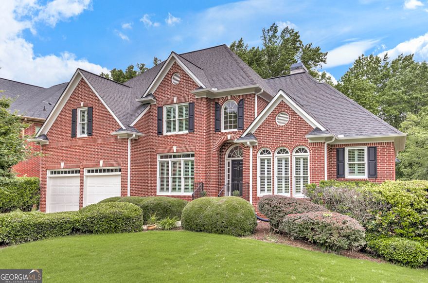 Nestled in the highly sought-after Northampton neighborhood in the heart of East Cobb, this stunning residence offers exceptional living with timeless elegance and modern updates. With high ceilings and an abundance of natural light throughout, this home is designed for comfort, entertaining, and everyday luxury.  The beautifully updated kitchen features a spacious island, ample counter space, and a sunny breakfast area perfect for casual dining. Just off the kitchen, a functional mudroom includes a main-level laundry room for added convenience.  The expansive primary suite is located on the main level and boasts a spa-like en suite bath. A formal dining room provides the ideal setting for hosting gatherings. Upstairs, you'll find three additional generously sized bedrooms and two full bathrooms.  The finished terrace level offers a large entertainment area, a built-in desk/office nook, an additional bonus room, a full bathroom, and a bar area with a sink ideal for entertaining. You'll also find abundant storage space throughout, including a dedicated storage room with custom shelving.  Step outside to a professionally landscaped, fully fenced backyard retreat featuring two gates, a gorgeous stone patio, and a built-in fire pit perfect for relaxing or entertaining year-round.  This exceptional home is just a short walk to Lassiter High School, Harrison Park, and the vibrant shops and restaurants of the East Cobb Shallowford area. Don't miss this rare opportunity to own a beautifully maintained home with ample storage in one of East Cobbs premier communities.  Contact us today to schedule your private showing.