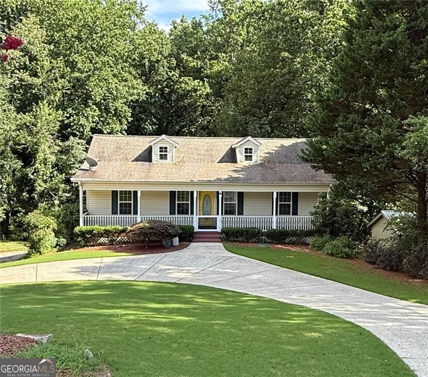 BEAUTIFUL MOVE IN READY RANCH BY THE LANIER LAKE IN CUMMING - FOR LEASE Welcome to a beautiful and spacious 3-bedroom, 2-bathroom ranch-style home located in a peaceful, non-HOA neighborhood in a Lake Lanier community in Cumming, Just minutes from Lake Lanier. This move-in-ready home offers a perfect blend of comfort, privacy, and outdoor living, with the added bonus of an unfinished basement t If you are looking for a property on the lake, with privacy and convenience. Don't look more. This is the perfect home for you and your family. This property doesn't sit directly on the lake, residents enjoy access to a **private neighborhood walking trail that leads straight to Lake Lanier**. It's the ideal setup for anyone who loves kayaking, fishing, or taking peaceful walks by the water, without the noise and crowds. And with no HOA, you can enjoy the freedom to live on your terms-park your boat or RV, landscape your yard how you like, and never worry about restrictive rules. Newly fresh painted in the interior, while you walk in the living are you will find a bright and airy layout filled with natural light. The kitchen is designed with function and charm, offering plenty of counter space and storage. The living and dining areas flow together effortlessly, making it easy to host gatherings or unwind after a long day. The primary suite is cozy and private, while the two additional bedrooms offer flexibility for guests, kids, or a home office. Beautiful Outdoors, the back deck overlooks a large, grassy backyard perfect for summer barbecues, morning coffee, or just soaking up the quiet. The circular driveway and oversized side-entry garage offer plenty of parking for multiple vehicles, and the long driveway even easily fits a boat or RV. The covered front porch adds a welcoming touch and a perfect spot to sit and wave to the neighbors. Location-wise, it's hard to beat. You're just minutes from shopping, restaurants, and entertainment, with quick access to GA 400 for an easy commute. The home is in the sought-after East Forsyth High School district, and you're close to parks, boat ramps, and trails, everything you need to enjoy life by the lake. If you've been looking for a home with charm, flexibility, and an unbeatable location near Lake Lanier, this is your best option.. Schedule a showing today, homes like this don't come around often!