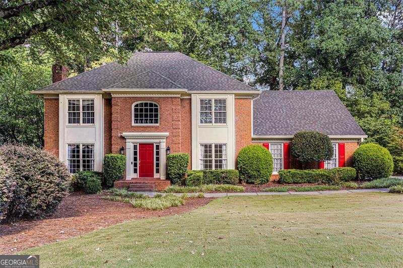 Imagine a home in a neighborhood that is so incredible that you buy it new and stay there over 40 years! That's exactly what the seller of this home did! Allow me to introduce 7695 Brigham Drive Atlanta, GA 30350. This one-owner beauty is located in the Sandy Springs/Dunwoody area in the Deerfield neighborhood, a highly sought-after swim/tennis community, and is now available at an incredible price to get into this neighborhood! This 4-sided brick home offers an abundance of space for everyone and provides the perfect space for entertaining! The lush landscaping provides beautiful curb appeal, which seems to say: show me more! As you step inside the home, the first thing you'll notice is the beautiful, curved staircase. The main level of the home has a large bedroom across the hall from a full bath, which is truly a rare find for the main level, and perfect for those who may need to avoid stairs! The formal living room at the front of the home is open to the foyer and formal dining room. The kitchen has all you'll need, including an island along with ample counter space to prepare meals, quality oak cabinetry and even a walk-in pantry! All appliances stay including the stainless-steel refrigerator, double ovens, built-in microwave, warming drawer and dishwasher. Just off the kitchen is the breakfast area, laundry/mud room and half bath. And that's not all! Just beyond the breakfast area, you will fall in love with the huge great room with a soaring cathedral ceiling, including skylights, beautiful beams, and stone fireplace with an abundance of natural light overlooking the private backyard. Just off the great room is a large sunroom, providing a beautiful and relaxing place for that morning coffee or evening glass of wine. Upstairs you will find the oversized primary suite, complete with ensuite. Just down the hall are 3 additional bedrooms, 2 additional full bathrooms and the back staircase, leading you right back down to the great room on the main level! This is an incredible floor plan! The terrace level of the home features a bonus/game room, huge den with fireplace, multiple closets, and tremendous storage space. Additional plumbing is already in place should you decide to add an additional bathroom. The top-notch amenities in Deerfield are a short 5-7-minute walk away. This includes an amazing pool with lap lanes and deep end, pavilion, tables, grill, bathrooms, playground, and tennis/pickleball courts! Deerfield has it all and just waiting for you! Are you ready for your next chapter to begin? Could this be the place to settle in for years to come and become only the second owner of this gem? Call today for a private showing and let the journey begin!