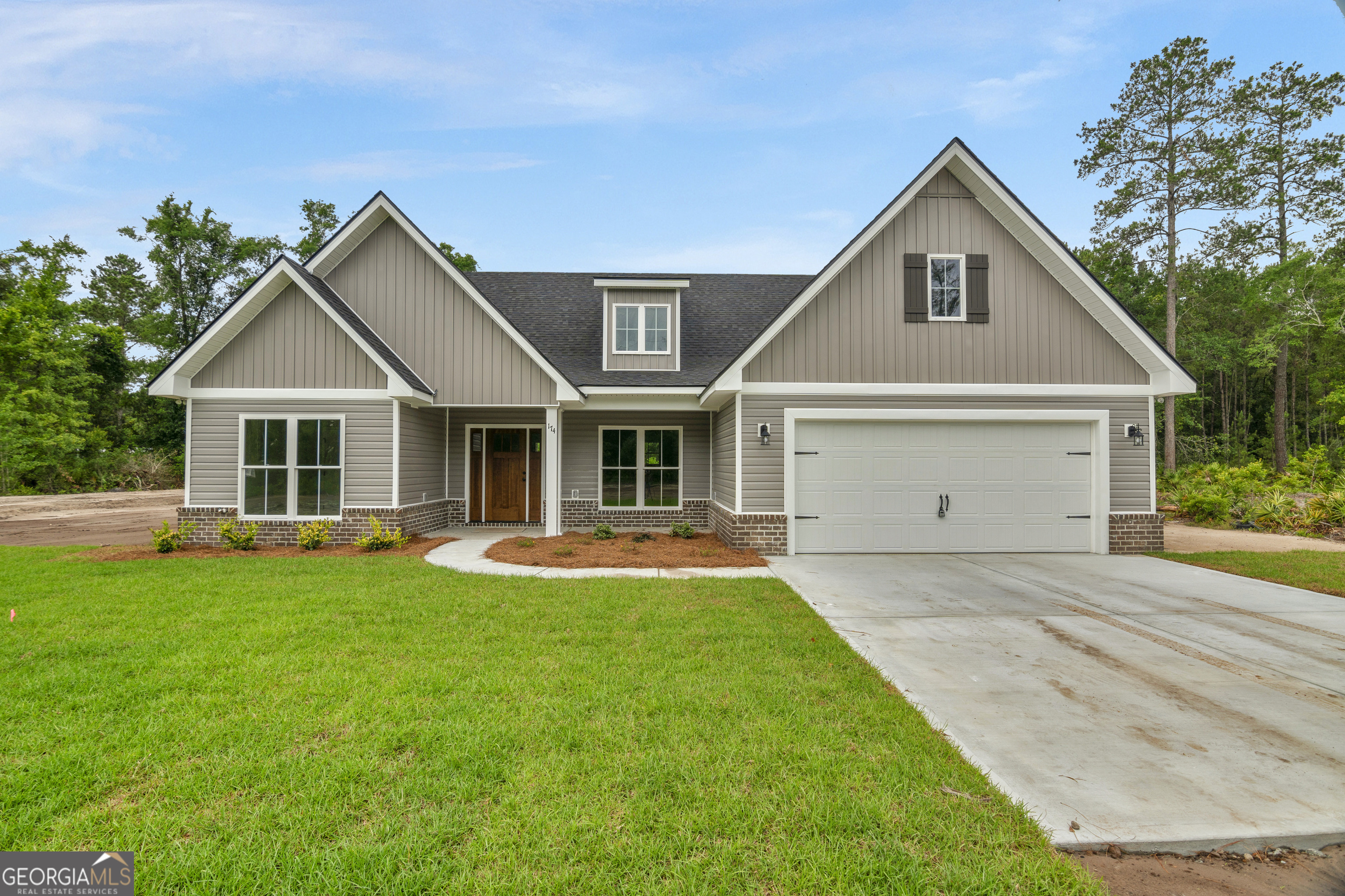 Welcome to your dream home on 2.4 acres in Long County! This stunning new construction offers 4 spacious bedrooms and 2 full bathrooms, all nestled on a generous 2.4-acre lot-perfect for privacy, outdoor living, or future expansion. This JM Allen Homes "Lainey" plan is move in ready and the builder is offering up to 10k towards closing costs or interest rate buy downs! Step inside to find an open-concept layout filled with natural light, modern finishes, and high-quality craftsmanship throughout. The kitchen features quartz countertops, custom cabinetry, stainless steel appliances, large island, and a separate pantry-ideal for both cooking and entertaining. The primary suite includes a large en-suite bath with double vanities, a soaker tub, large walk in shower, and walk in closet! Enjoy peaceful mornings on the covered front porch or host gatherings on the back patio overlooking your backyard. No HOA. The possibilities are endless-build a workshop, add a pool, or just soak in the wide-open views. Located just minutes from local amenities and schools, and a short commute to Fort Stewart or Brunswick! This home combines the tranquility of country living with everyday convenience. Schedule your showing today-this one won't last long!