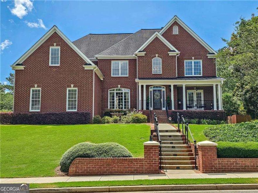 Welcome home to the quaint St. Michelle neighborhood in the Crabapple area of Alpharetta. This house has been beautifully maintained and is now available for rent. With its impressive five bedrooms and four and a half baths, this brick traditional home provides ample space with 3,972 square feet. Entering the front door, you will be greeted by a majestic two-story foyer which sits between the formal dining room and living room or study. Continue past the front staircase into a light-filled, two-story great room that opens up to the informal dinette area and kitchen, the perfect space for entertaining or just enjoying time with family. Additionally, the main floor boasts a guest bedroom with an ensuite bathroom, an additional half bathroom for guests, and a separate laundry room. Walk out to the private porch and backyard. Use one of two staircases to get up to the second level where you'll find four additional bedrooms and 3 more bathrooms. The oversized primary bedroom includes a sitting area, large closet, and large bathroom with double vanity, walk-in shower, and jacuzzi tub. Oak hardwood floors throughout the entire home. Attached 3-car garage. All appliances are included as well as the blinds and window treatments. Located in a top-rated school district. Walking distance to Crabapple restaurants and shopping, a short drive to everything Alpharetta has to offer. $5000/month rent includes weekly lawn maintenance. Home is not being offered furnished. The owner/landlord will be using the basement for storage.