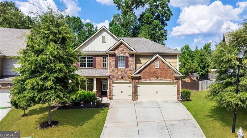 Featuring an EXQUISTIVE & CHARMING home nestled in the sought-after 'Amberleaf' Subdivision in Parkview High School District. Beautifully built and thoughtfully designed, this home features five bedrooms, four full bathrooms, THREE car garage, a COVERED patio, hardwood flooring on the main level, an extra-large flex loft area on the upper level, flat & spacious, fenced yard, UPDATED light fixtures, a splendid primary suite, private guest suite/in-law suite & much more. Starting from its appealing curb appeal on a cul-de-sac with brick and STONE exterior front and relaxing porch for the quieter moments. Venturing inside, be invited by the GRAND 2-story foyer with a sparkling large CRYSTAL chandelier, moving you seamlessly into the 2-story formal living area and formal dining area with coffered ceilings. A chef's dream kitchen with white wooden cabinetry, a large kitchen island all topped with STONE countertops, a walk-in pantry, and stainless-steel appliances overlooking the breakfast area and the expansive living room with built-in bookshelves and a warm, cozy fireplace. The main level also offers a private guest suite with a full bathroom tucked away for privacy. Upstairs, you'll be amazed by the roomy loft/flex area, ideal for a 3rd living room, game/media room, kid's play area, or even an office. Three spacious secondary bedrooms, with one of them being an en-suite with a personal, full bathroom. The massive primary suite is truly mind-blowing. Be amazed by the space and the homely feel in this room that offers a large separate sitting room, his and hers walk-in closets, and a tiled primary bathroom featuring double vanities, a separate tub & a spacious shower. The backyard is truly an entertainer's paradise. Fully fenced in, with a large, covered porch, there is room for endless activities with its airy ambiance throughout. This delightful home not only boasts an impressive living & outdoor space but also a perfect mix of comfortable & luxury living.