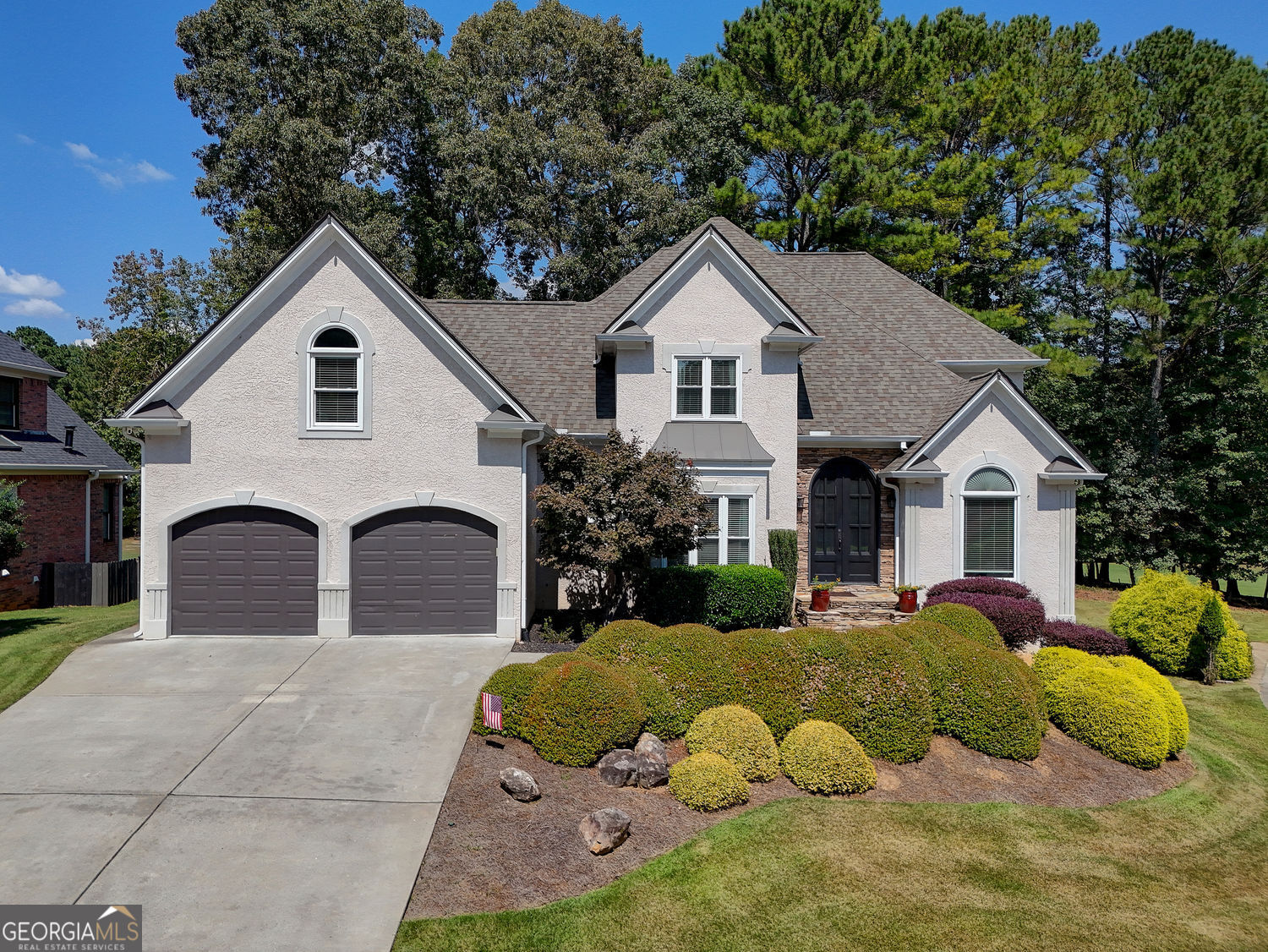 Fabulous Executive Home on Eagle Watch Golf Course Welcome to this exceptional residence perfectly situated on the 3rd hole of the Eagle Watch Golf Course. Soaring windows showcase sweeping views from nearly every room, while gleaming hardwood floors and abundant natural light create a warm, inviting atmosphere. The main level features a luxurious primary suite, spacious family room, elegant dining room, private office, and a beautifully designed kitchen ideal for both everyday living and entertaining. Upstairs, you'll find three generously sized secondary bedrooms, two full bathrooms, and a large bonus room that can easily serve as a fifth bedroom, playroom, or media space. The finished terrace level impresses with a built-in bar and full bath-perfect for gatherings or a private retreat. Step outside to your own backyard oasis-enjoy morning coffee or sunset views while watching golfers pass by. A fenced area offers a safe space for pets or play, and a fire pit adds the perfect finishing touch for outdoor relaxation. Tucked away on a quiet cul-de-sac of well-maintained homes, this property blends privacy with community. Eagle Watch residents enjoy resort-style amenities including swim, tennis, pickleball, volleyball, basketball, and a full calendar of social events. Golf membership is available separately. Don't miss this rare opportunity to experience the best of luxury, lifestyle, and location. Do you want me to also create a shorter MLS-ready version that hits the highlights but stays within character count limits?