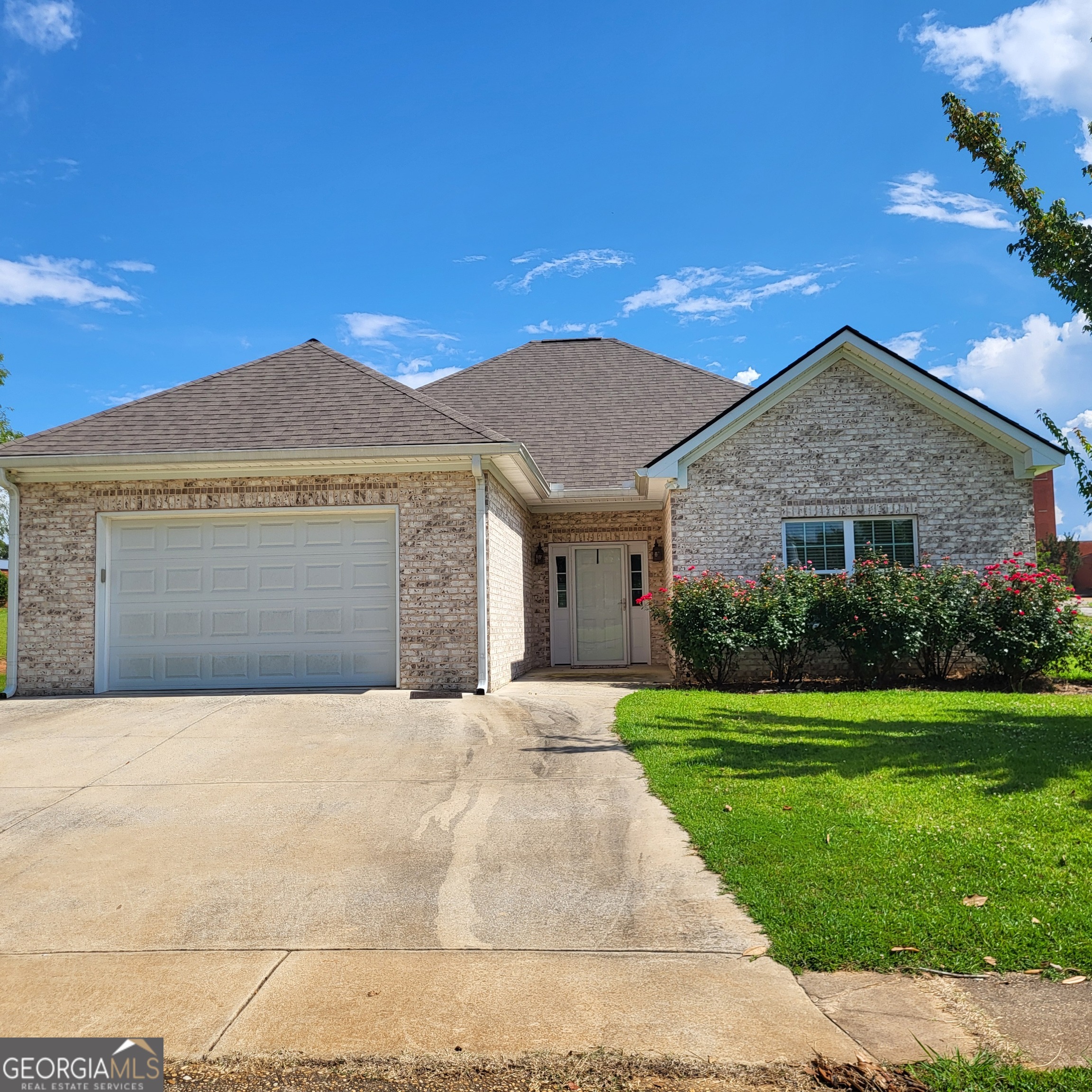 Don't miss out on this Lovely 2BR/2BA Brick home located in the Heart of Valley! This home is conveniently located close to I-85, shopping, restaurants, and within walking distance to the school! Home has an open floor plan with a Living Room/Dining Room combo. The open floor plan flows into the den offering up more living space. The kitchen boasts quartz countertops, custom cabinetry, appliances, pantry, and b'kfast area. There is LVP flooring throughout and tile flooring in the kitchen and baths. The MBR is very spacious and has a large WIC. Master bath features a zero-entry tile shower that is handicap accessible. The 2nd bath features tub/shower combo and quartz countertops. The secondary bedroom is ample sized with dual closet space. Other features are 2-car garage, patio area, and corner lot. Call today to schedule a tour!