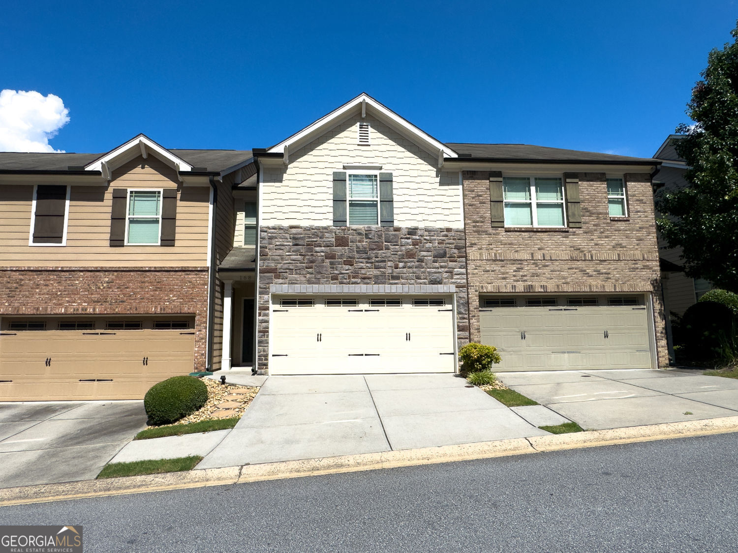 Spacious 3 Bedroom, 2.5 Bathroom Townhome in Prime Location! Welcome home to this beautiful and well-maintained 3-bedroom, 2.5-bathroom townhome, ideally situated between I-75 and I-575-just minutes from shopping, dining, and the vibrant energy of Downtown Woodstock. Step into an open-concept layout that's perfect for entertaining, with a generous living and dining area that flows effortlessly into the kitchen. The kitchen features an updated backsplash, a gas range with broiler, and plenty of counter space and cabinetry to meet all your cooking needs. All appliances are included- refrigerator, microwave, washer, and dryer-so you can move in with ease. Upstairs, the oversized master suite offers a peaceful retreat with a spacious walk-in closet and a private en-suite bath. Two additional bedrooms share a full bathroom, along with a flex space that's ideal for a home office, study area, or playroom. The convenient upstairs laundry makes everyday chores a breeze. Enjoy a comfortable lifestyle in a prime location, with all the modern features you're looking for. Don't miss out-schedule your showing today!
