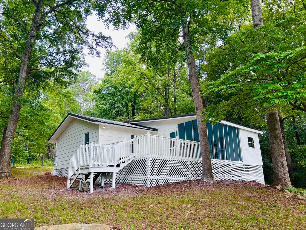 Photo of 122 Flat Rock Rd, Eatonton, GA 31024 (MLS # 10837847)