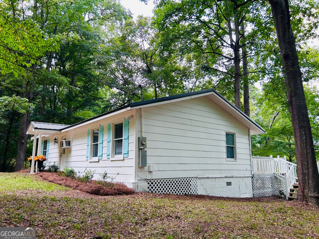Photo of 122 Flat Rock Rd, Eatonton, GA 31024 (MLS # 10837847)