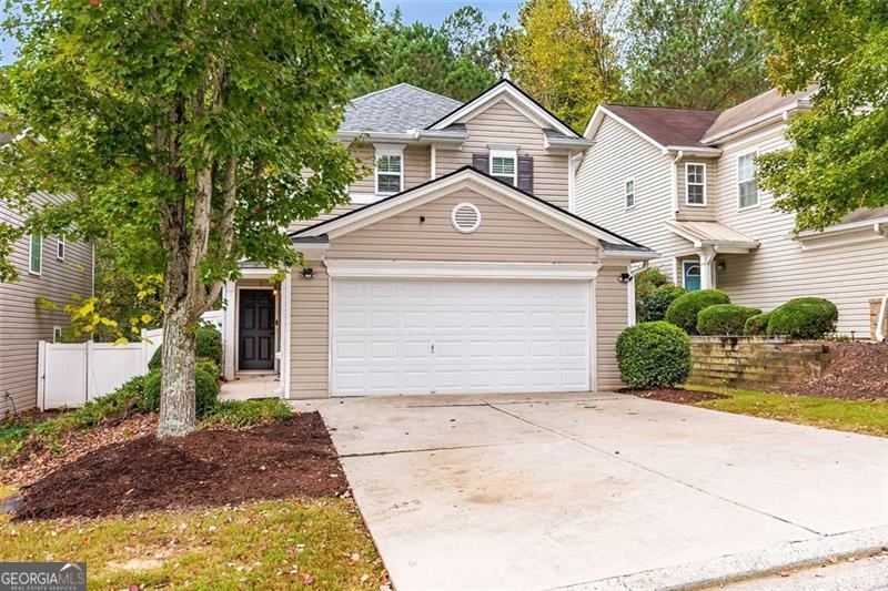 Get ready to fall in love with this cheerful and versatile 2-bedroom, 2.5-bath home that perfectly blends comfort, style, and opportunity! From the moment you step inside, you'll be welcomed by a spacious and inviting open-concept living area, designed for both everyday comfort and easy entertaining. The kitchen offers plenty of cabinetry and flows seamlessly into the living and dining spaces, making it functional and welcoming. Upstairs, you'll find two well-appointed bedrooms, including a primary suite with a private ensuite bath and a second full bathroom for guests. The laundry is conveniently located on the upper level for ease and accessibility. A generous bonus/flex space adds versatility-perfect for a home office, creative nook, playroom, or quiet retreat. Need a third bedroom? The flex space could easily be finished out to create one. Step outside and enjoy a quaint, fenced backyard-ideal for relaxing, gardening, or casual gatherings. Located in a friendly community, residents enjoy access to great neighborhood amenities, including a sparkling pool and tennis courts. Just minutes from downtown Dallas, you'll be close to local shops, restaurants, parks, and the Silver Comet Trail. With flexible living spaces, a welcoming neighborhood, and a location that offers the best of both comfort and convenience, this home is full of potential. Come take a look and imagine it as your own! The back yard fence has been replaced since photos, along with new planter boxes and a garden setup.