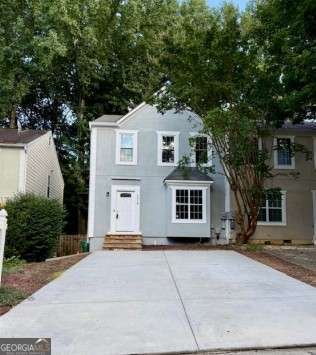 This PEACHTREE CORNERS TOWNHOME is truly a treasure! Prepare yourself to fall head over heels for this stunning, beautifully updated, oversized townhouse that's ready to move in and filled with charm! The main level boasts LVP floors that are sleek and gleaming, adding warmth and elegance to every step, and stylish white kitchen cabinets that exude modern sophistication! The fresh paint and vibrant energy of this home make it almost tempting to move in! For those who enjoy entertaining, the open-concept living area is the perfect place to be, with a cozy, inviting fireplace that provides the perfect ambiance for every occasion! Upstairs, you can experience pure bliss in two Owner's Suites, each with its own private full bathrooms and walk-in closets. With a new roof, driveway, siding, exterior and interior paint, deck, and new sliding doors, you're ready to live without worry! Your private fenced backyard is the perfect spot for sizzling BBQs, relaxing stargazing nights, or whatever your heart desires! PRIME LOCATION ALERT! You're just minutes away from top-tier dining, fabulous shopping, and exhilarating activities thanks to our perfect location near 400 and 285. This is not just a home -- it's a vibrant lifestyle that's waiting for you to take advantage of! Don't miss out on this amazing opportunity.
