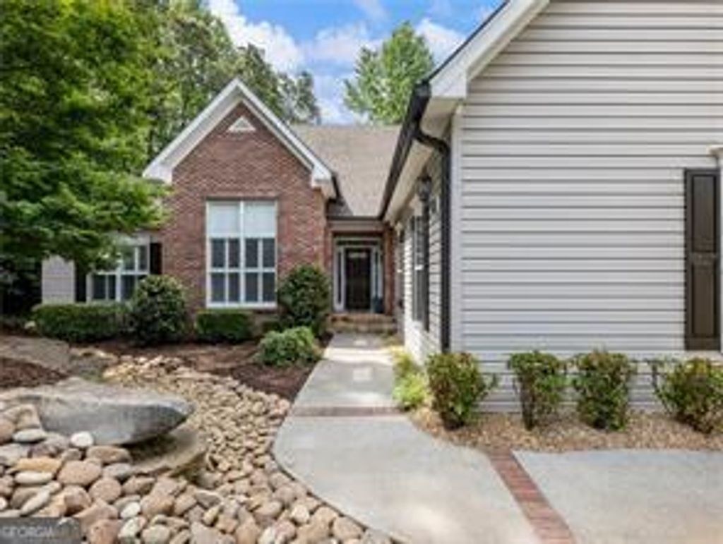 Photo of 4857 Netherlands Place, Flowery Branch, GA 30542 (MLS # 10794313)
